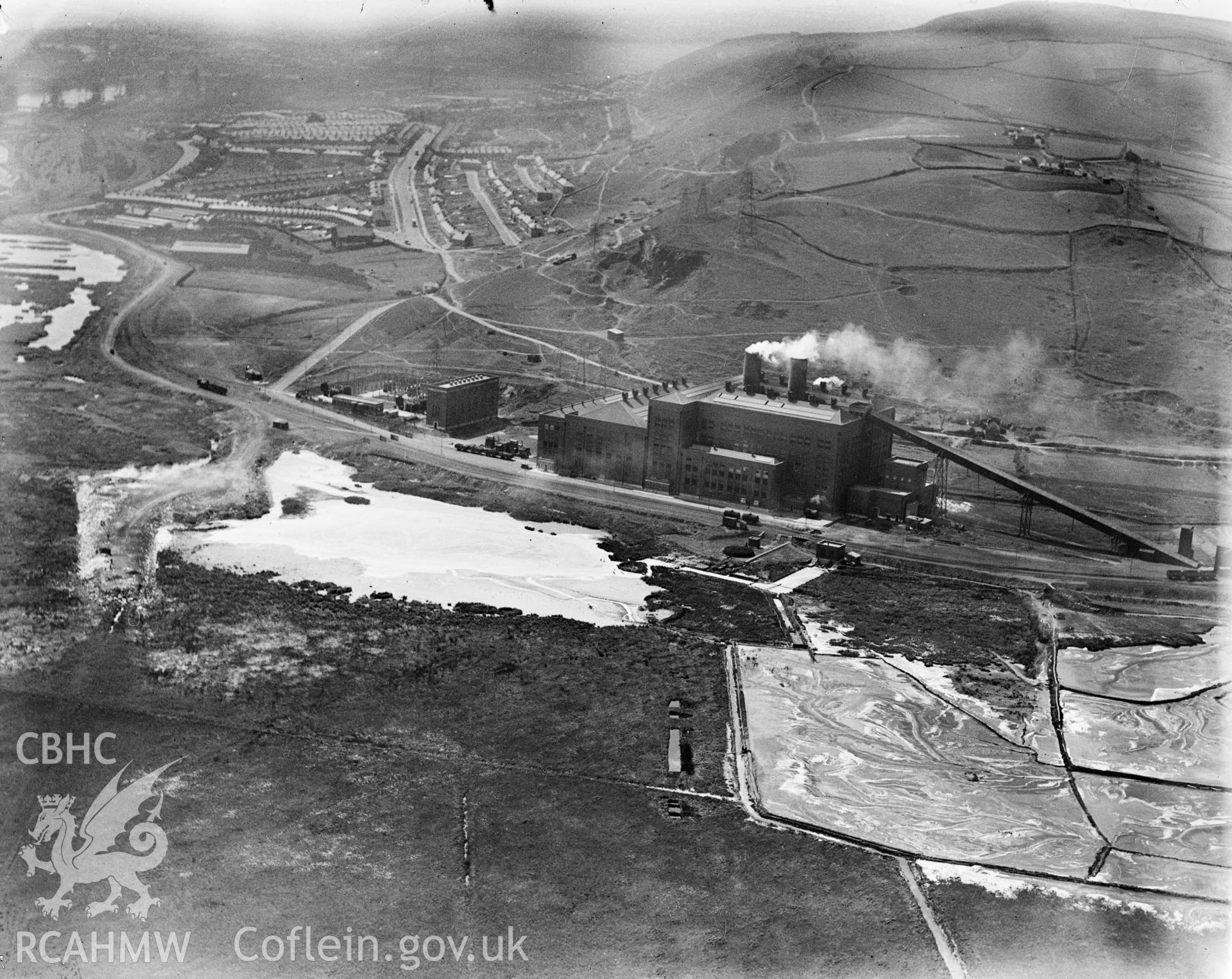 View of Tir John power station, Swansea (A.R.P. County Borough of Swansea), oblique aerial view. 5?x4? black and white glass plate negative.