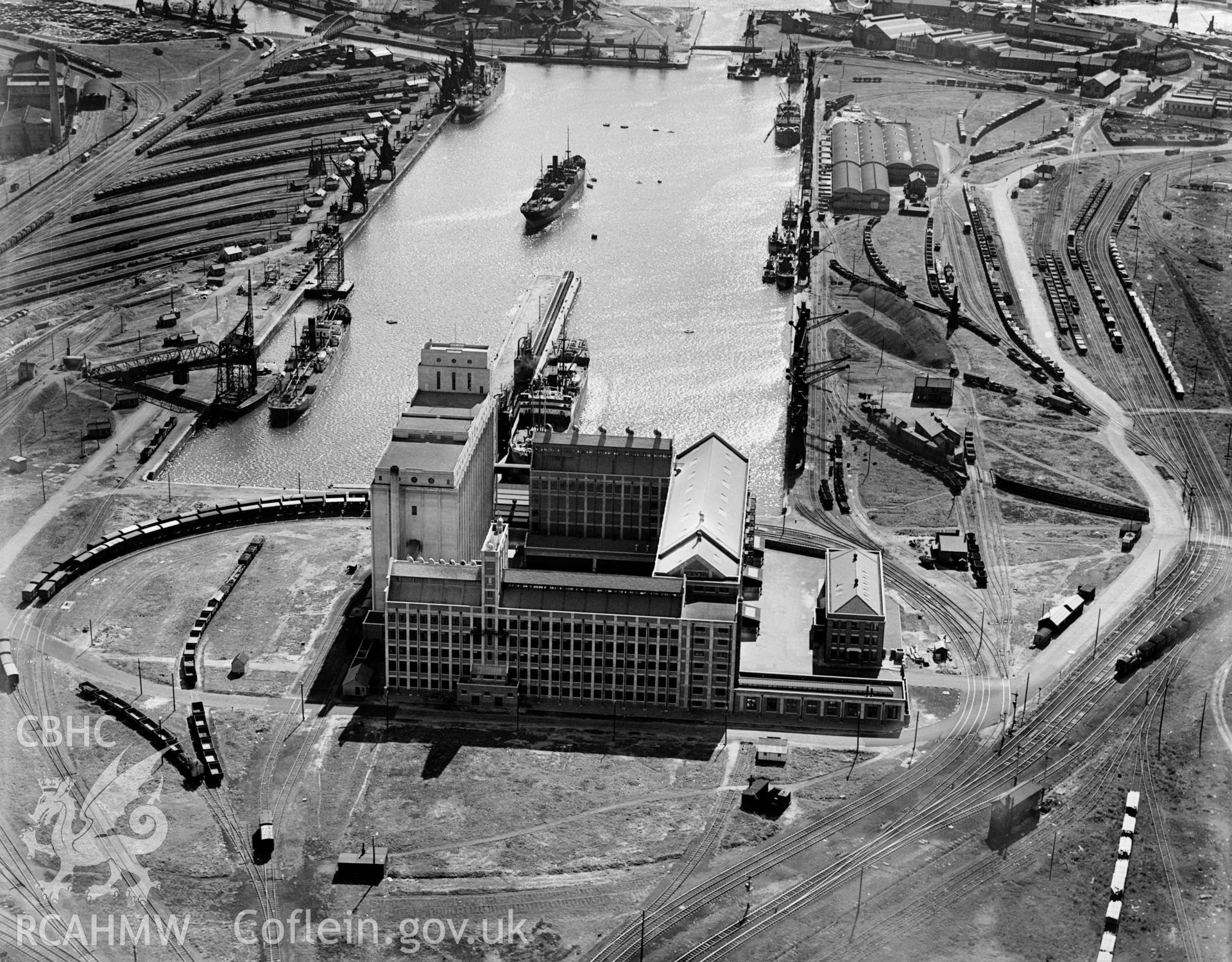 View of Spillers Ltd., Cardiff, oblique aerial view. 5?x4? black and white glass plate negative.