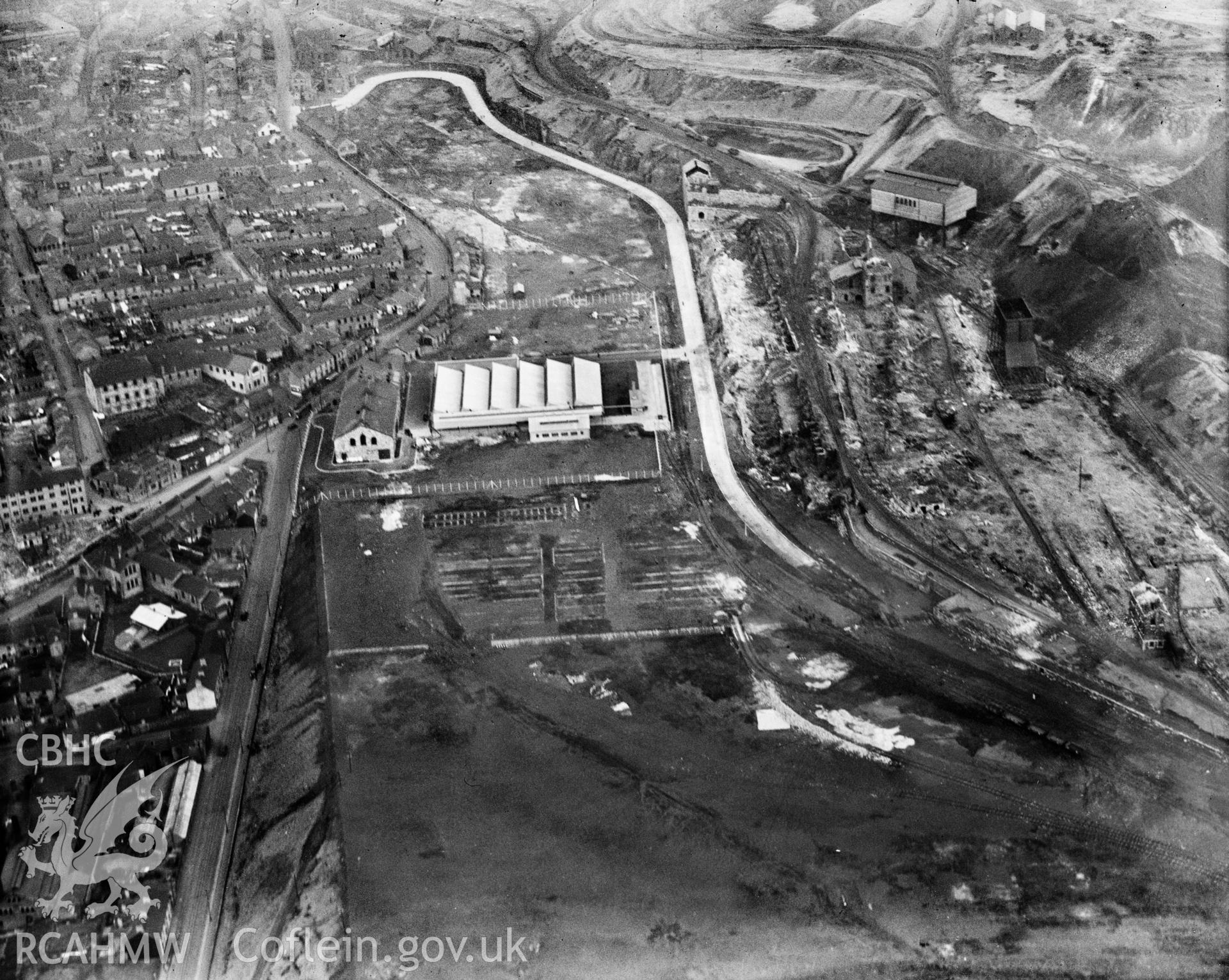 View of Dowlais Ironworks showing Dowlais great tip, oblique aerial view. 5?x4? black and white glass plate negative.