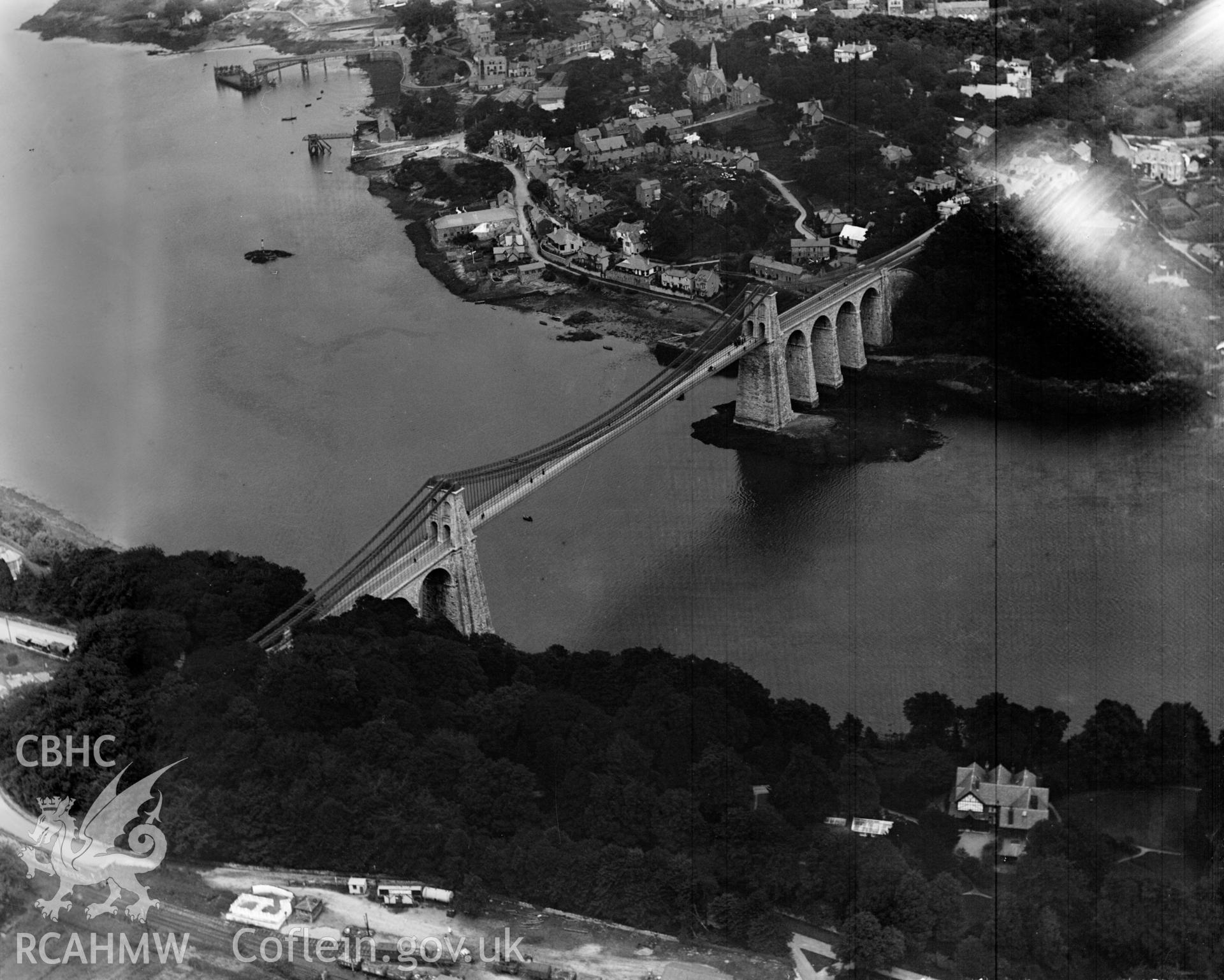 View of the Menai suspension bridge, Bangor, oblique aerial view. 5?x4? black and white glass plate negative.