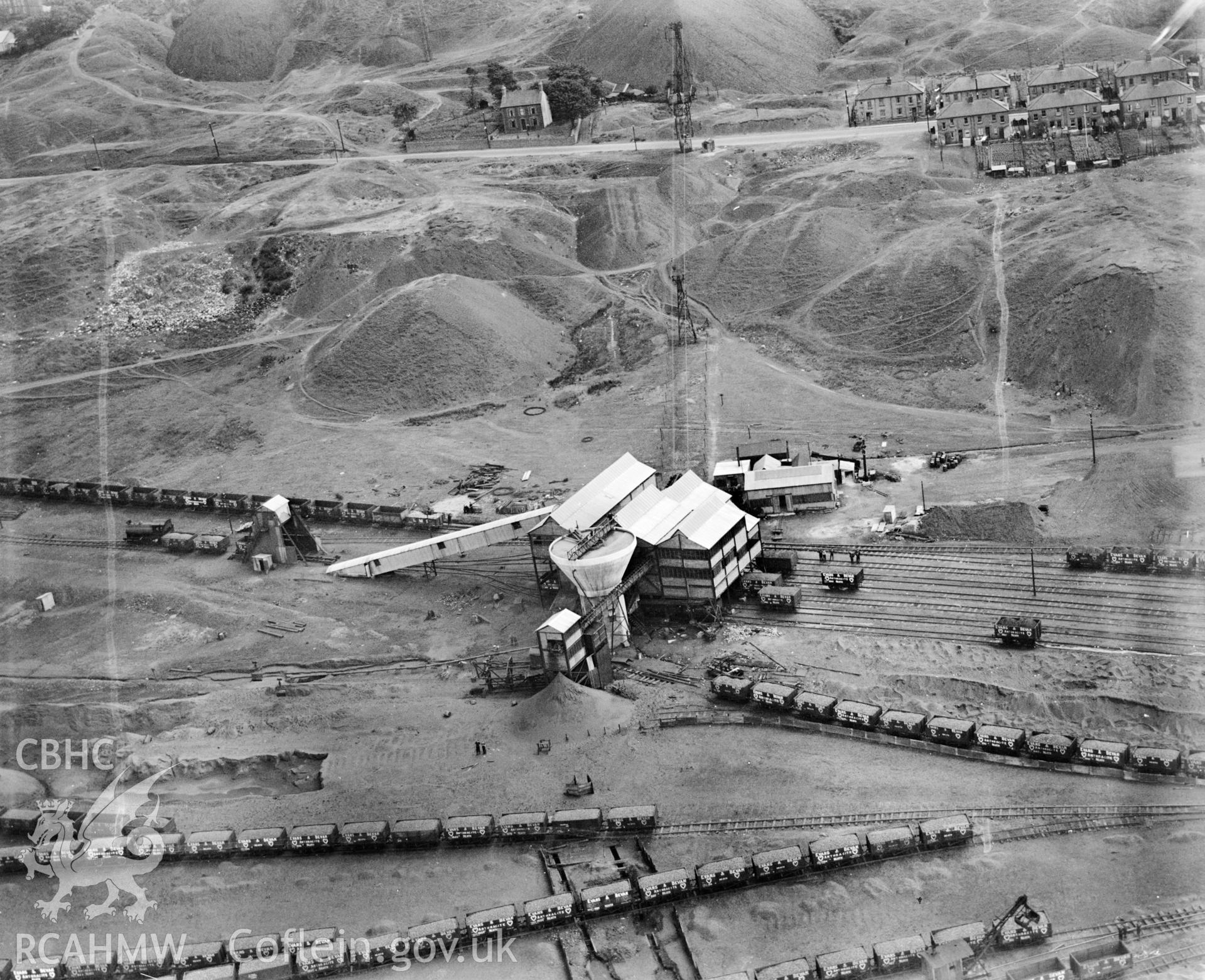 View of Onllwyn coal washery, processing and distribution centre, commissioned by Evans & Bevan, Neath. Oblique aerial photograph, 5?x4? BW glass plate.