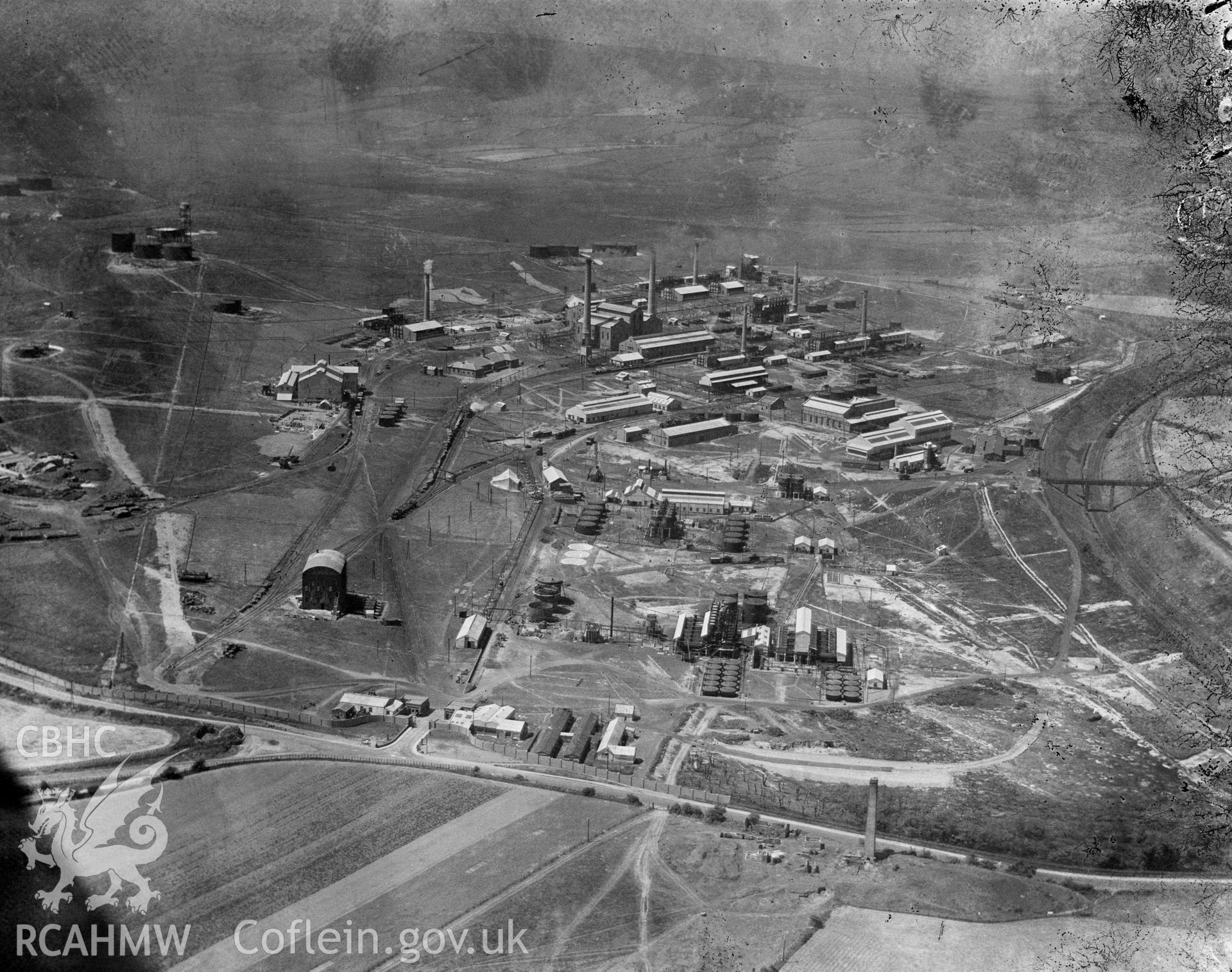 Black and white oblique aerial photograph showing Llandarcy Oil Refinery from Aerofilms album no. W.30, taken by Aerofilms Ltd and dated 1923.