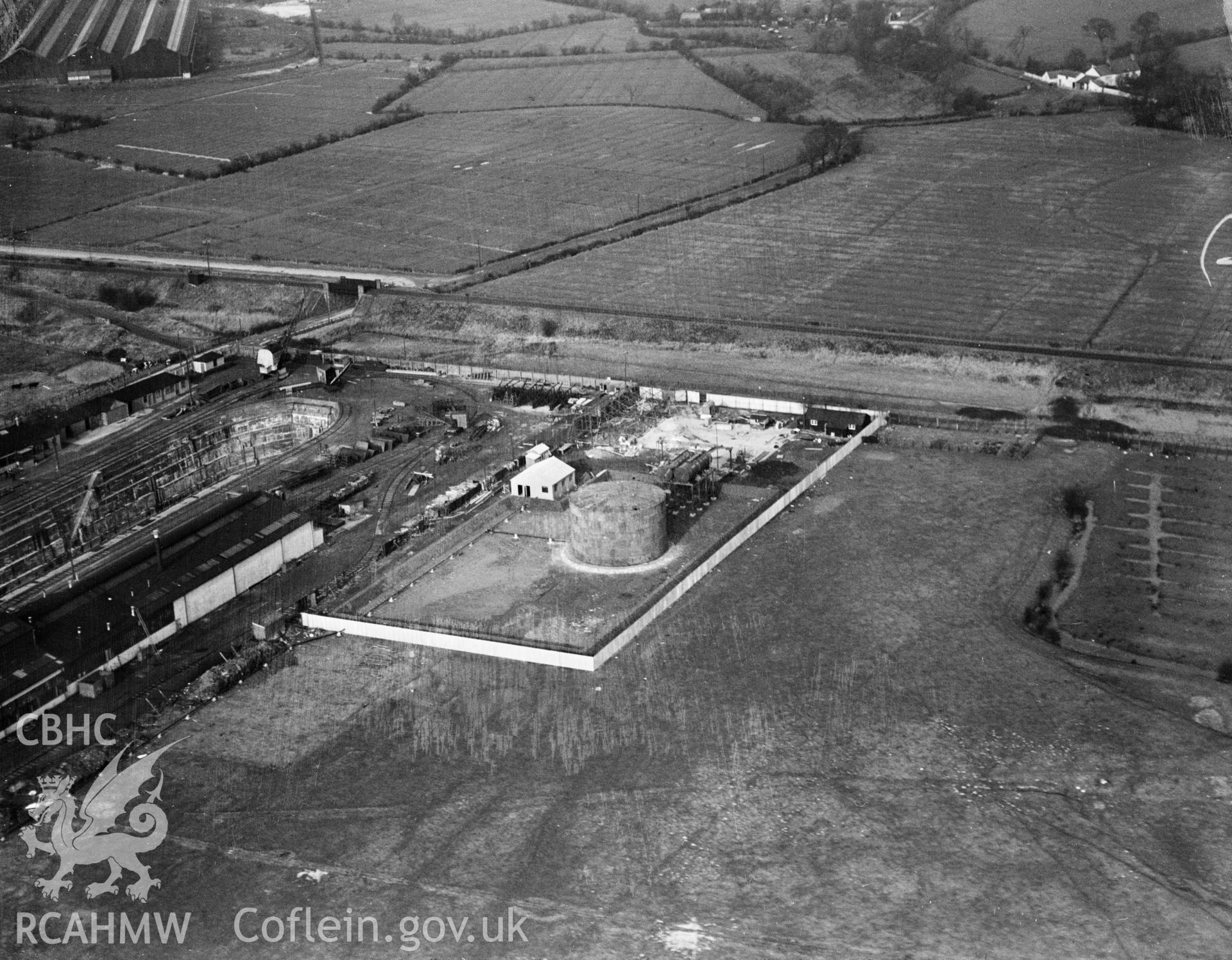 View of British Oil Storage Co., Union Dry Dock, Newport, oblique aerial view. 5?x4? black and white glass plate negative.