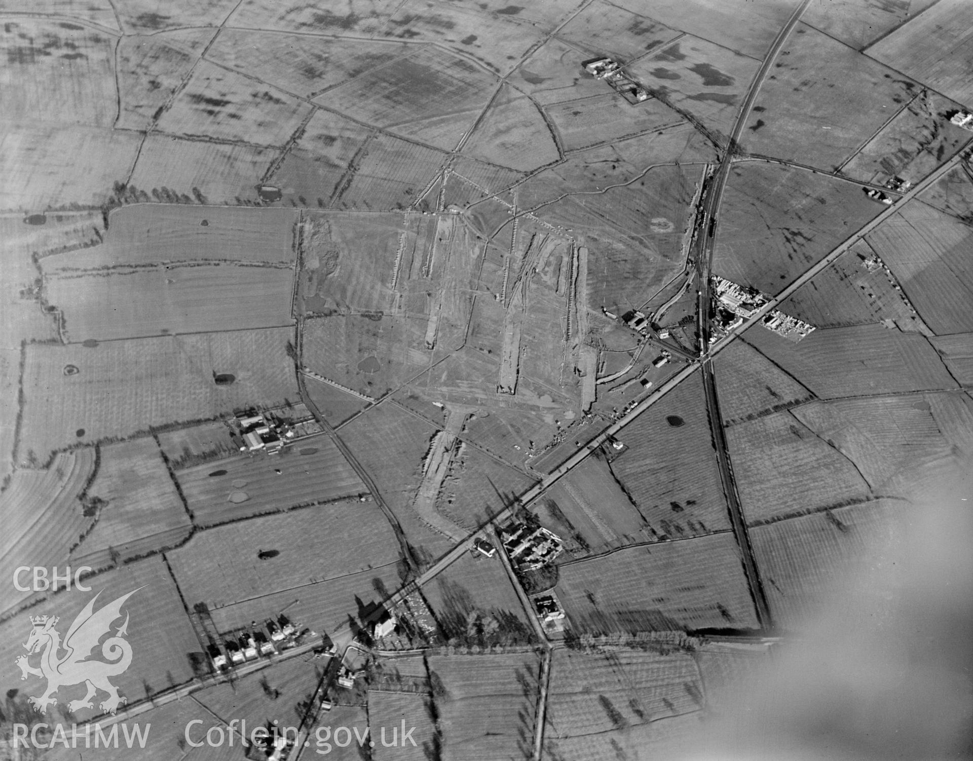 View of Vickers-Armstrong Ltd. Works - Broughton airfield under construction. Oblique aerial photograph, 5?x4? BW glass plate.