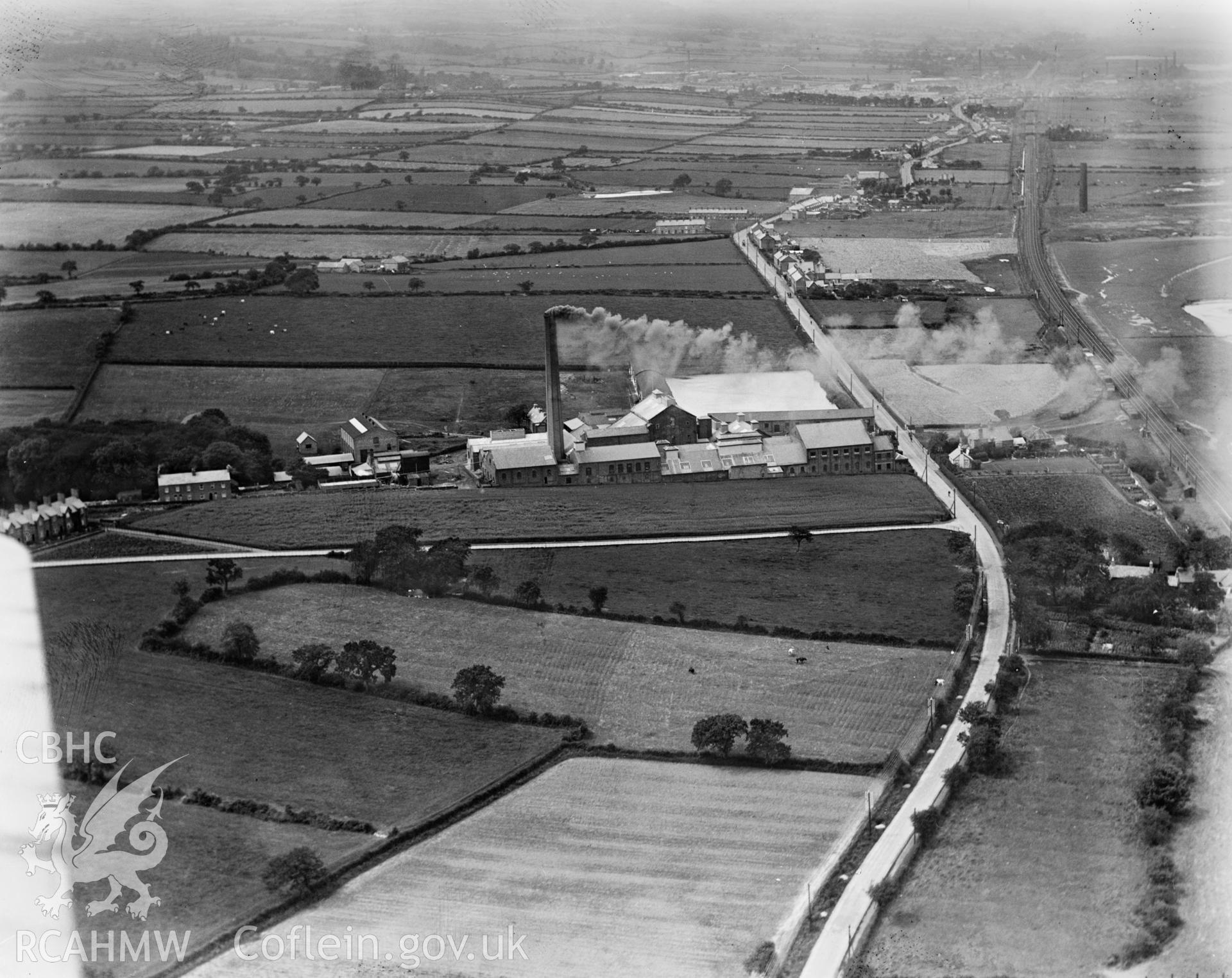 View of the North Wales Paper Company Ltd, Flint, oblique aerial view. 5?x4? black and white glass plate negative.