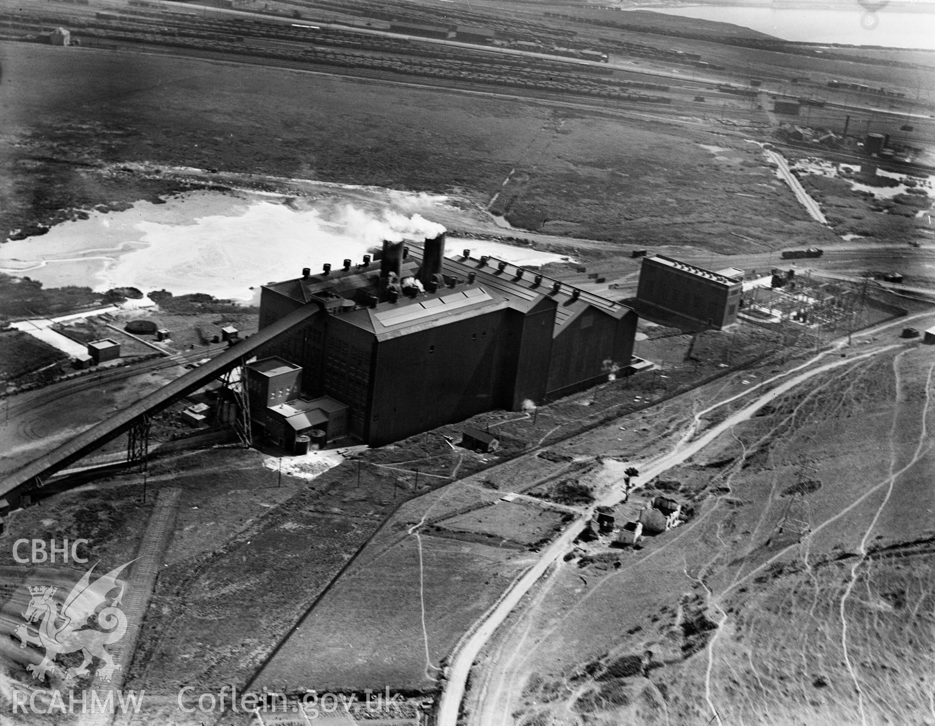 View of Tir John power station, Swansea (A.R.P. County Borough of Swansea), oblique aerial view. 5?x4? black and white glass plate negative.