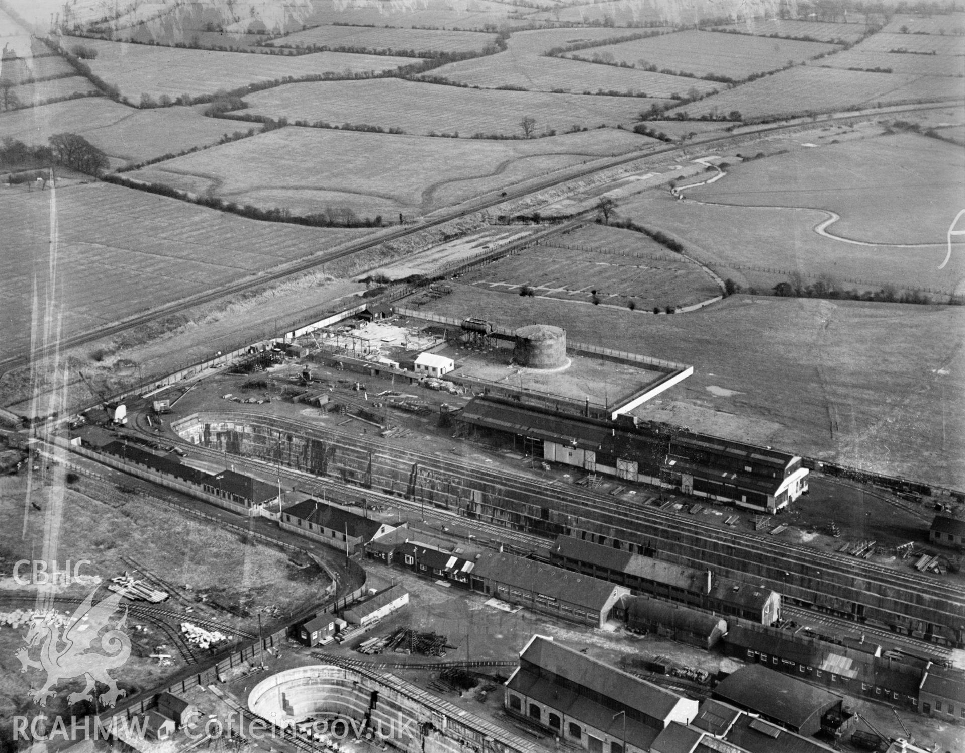 View of British Oil Storage Co., Union Dry Dock, Newport, oblique aerial view. 5?x4? black and white glass plate negative.