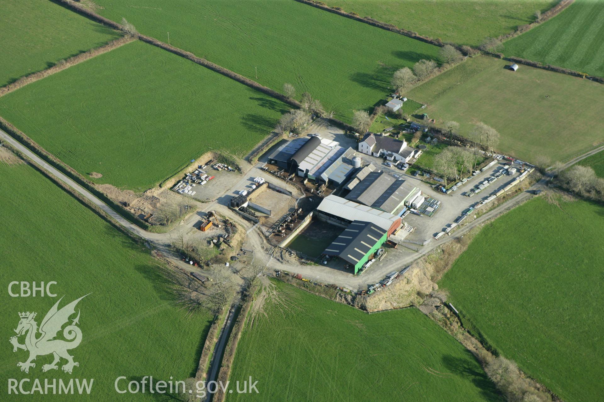 RCAHMW colour oblique aerial photograph of Velindre Farm Pillar Stone. Taken on 13 April 2010 by Toby Driver