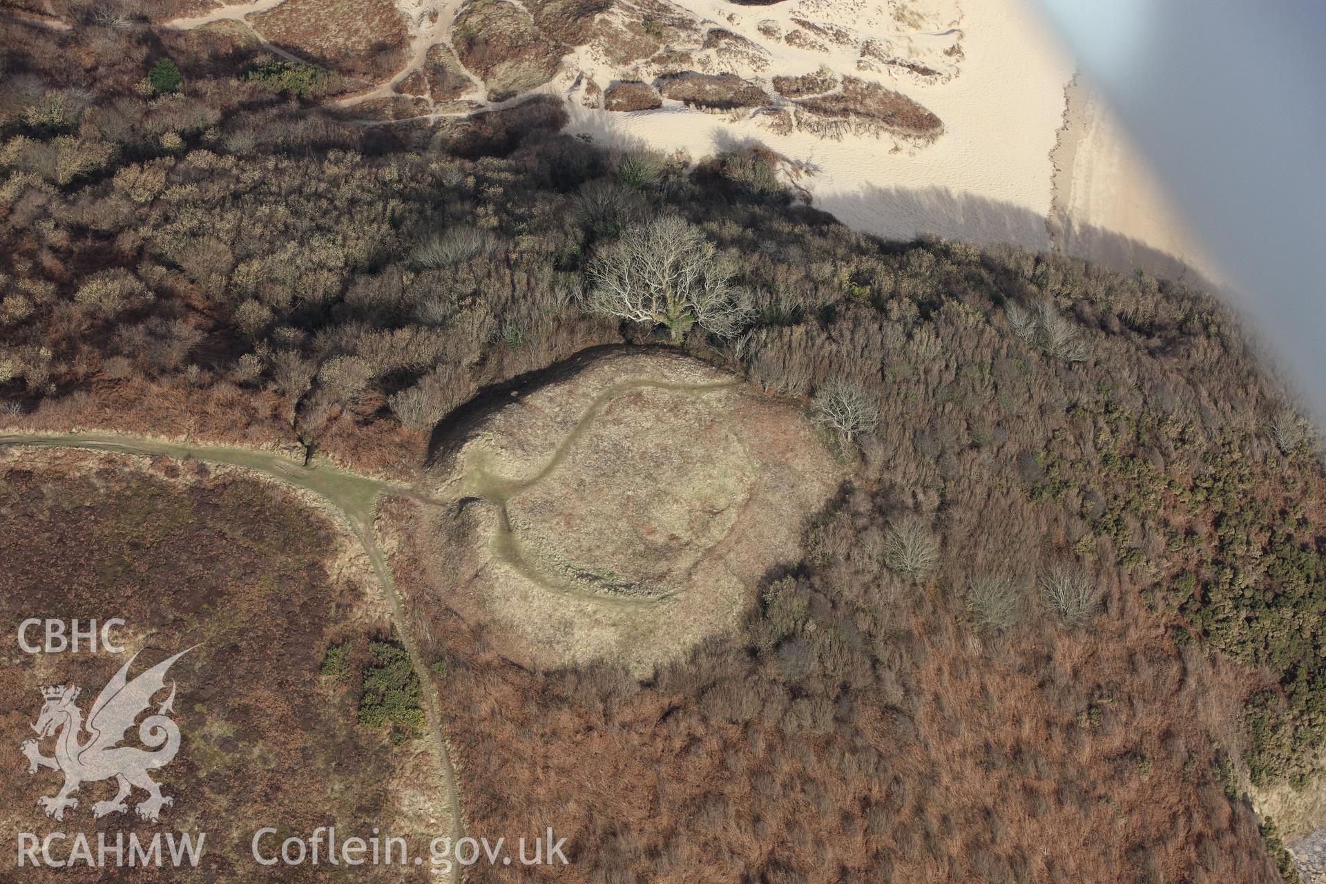 RCAHMW colour oblique photograph of Penmaen Burrows Ringwork. Taken by Toby Driver on 02/03/2010.