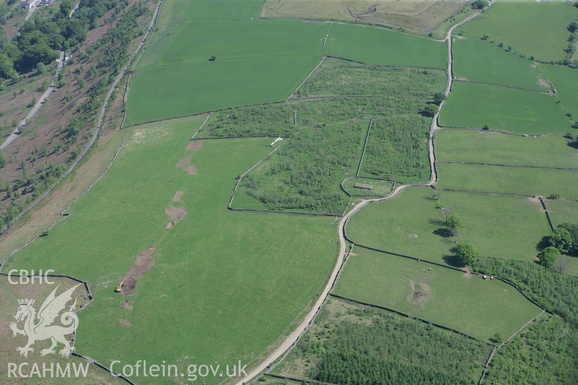 RCAHMW colour oblique photograph of Capel y Brithdir, New Tredegar, with the site of the Tegernacus Stone in the foreground. Taken by Toby Driver on 24/05/2010.