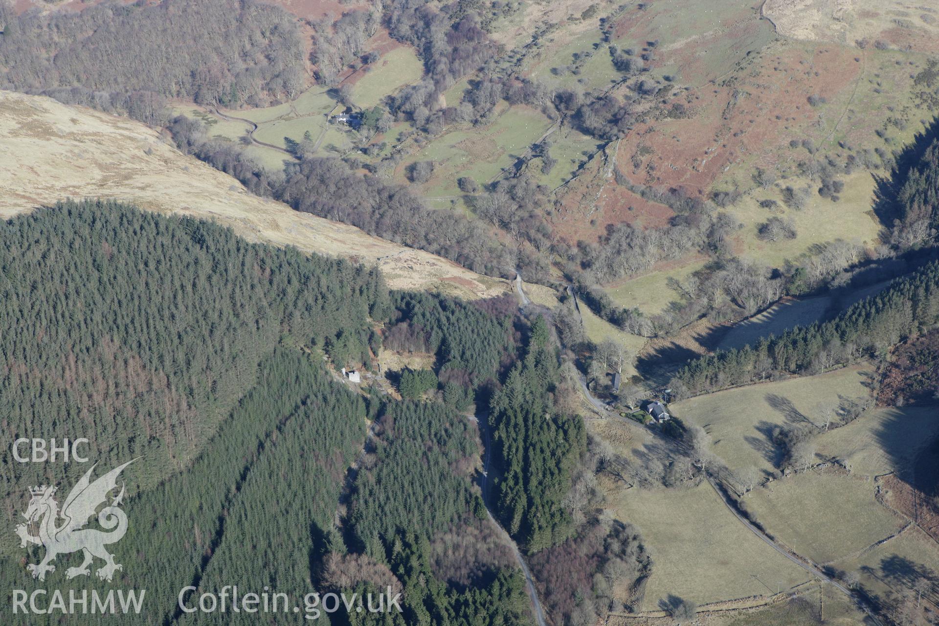 RCAHMW colour oblique photograph of Ystrad Einion lead mine buildings and water wheel. Taken by Toby Driver on 08/03/2010.