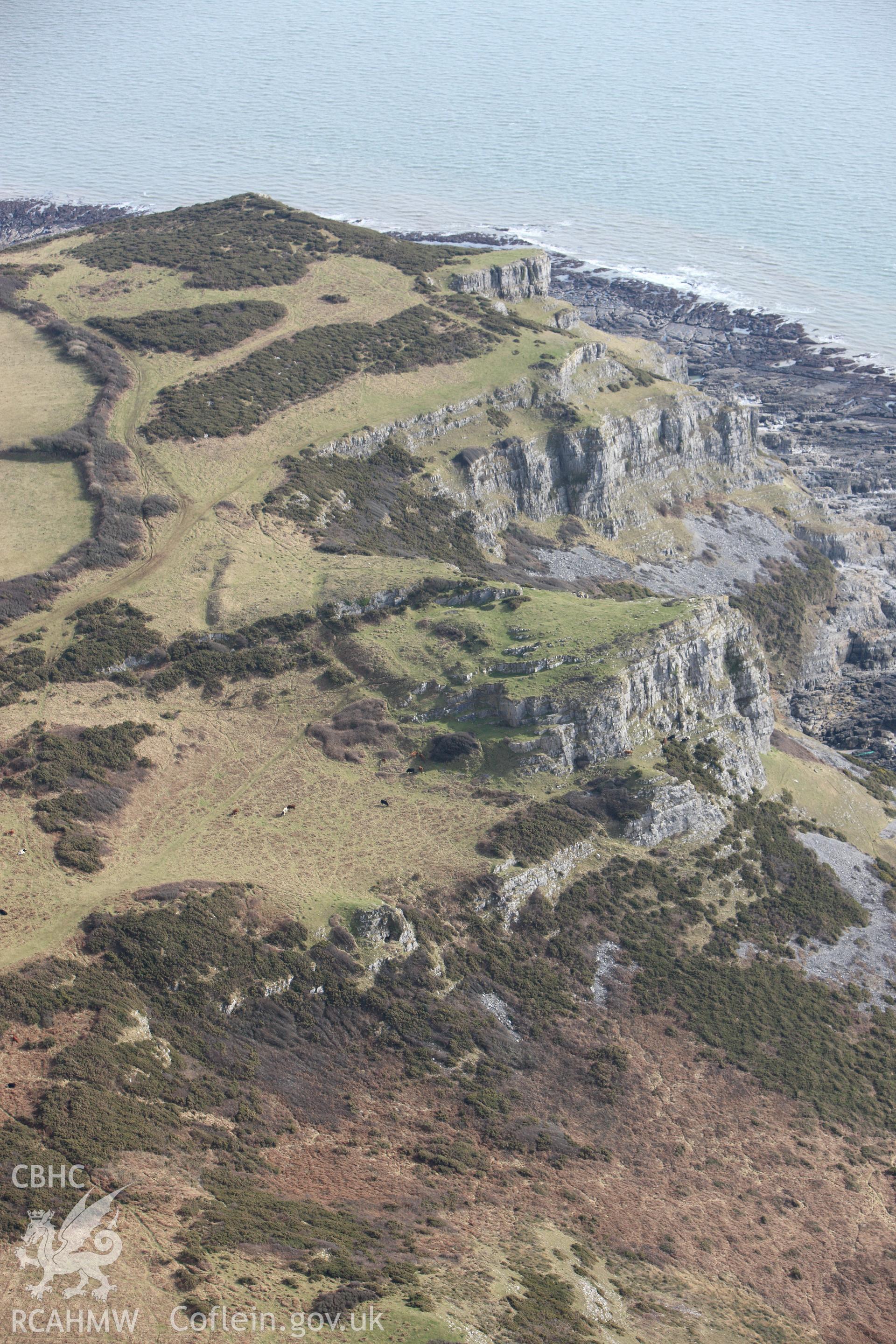 RCAHMW colour oblique photograph of High Pennard Hillfort. Taken by Toby Driver on 02/03/2010.