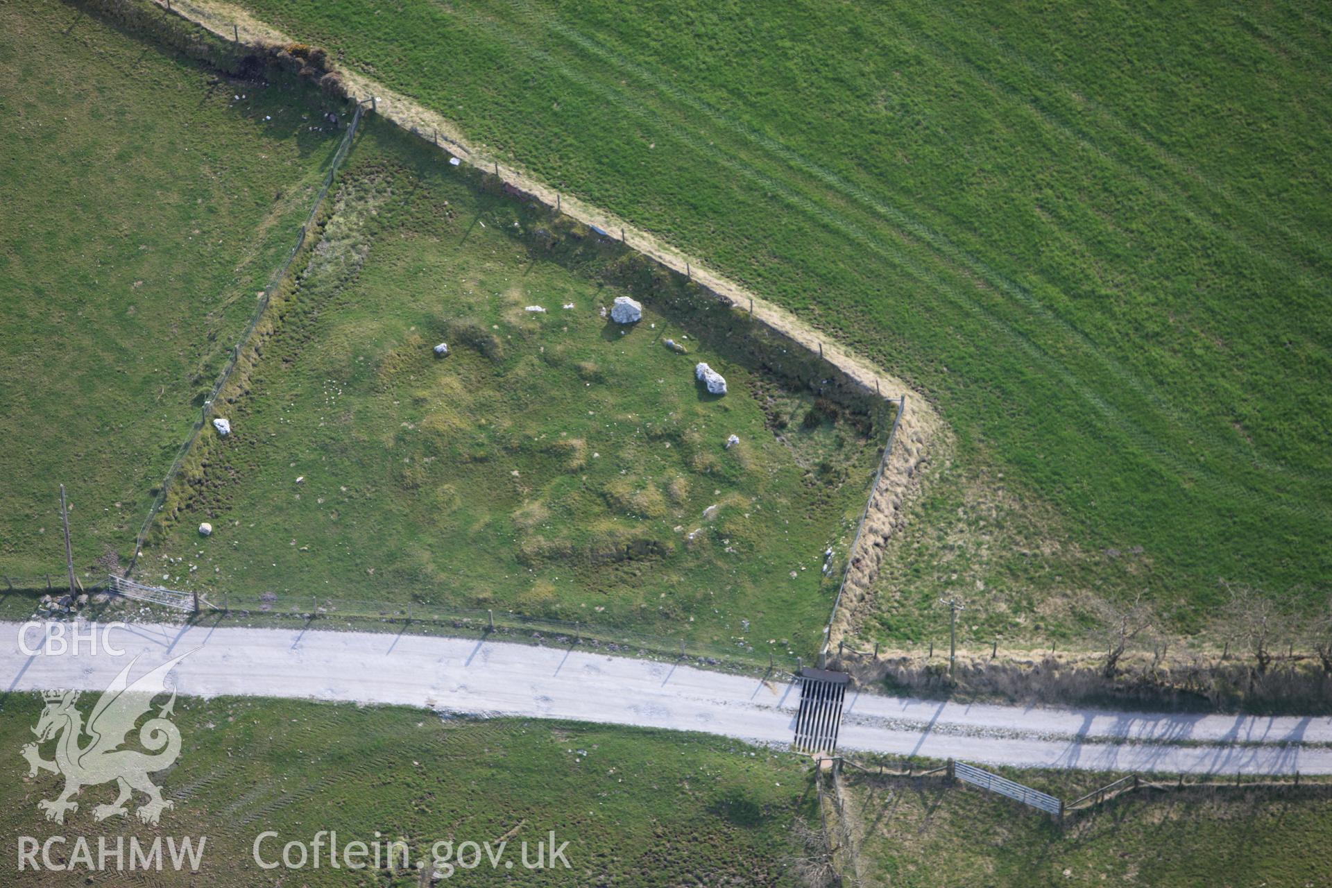 RCAHMW colour oblique aerial photograph of Crug Gwyn. Taken on 13 April 2010 by Toby Driver