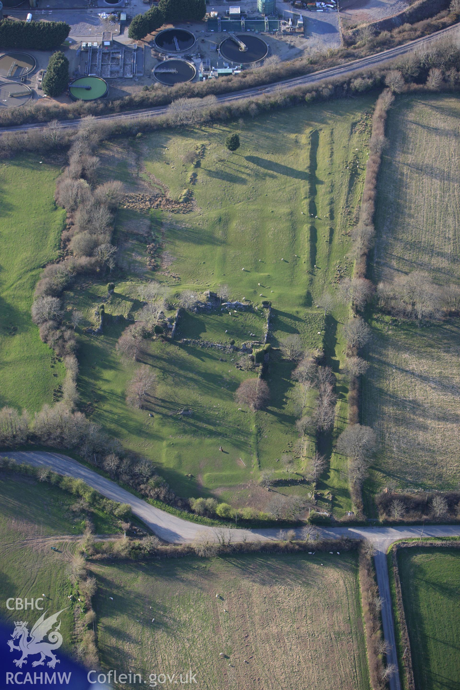 RCAHMW colour oblique aerial photograph of Haroldston House Garden Earthworks, Haverfordwest. Taken on 13 April 2010 by Toby Driver