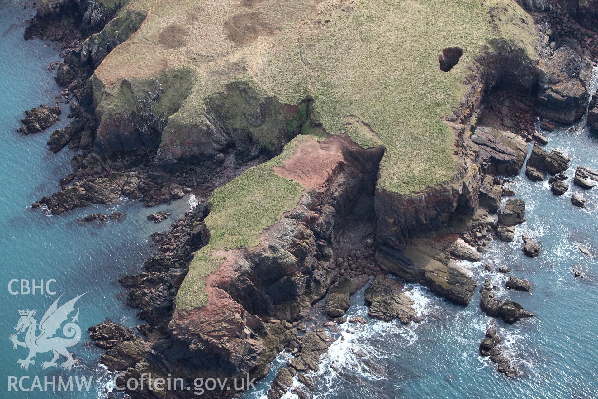 RCAHMW colour oblique aerial photograph of Nab Head promontary. Taken on 02 March 2010 by Toby Driver