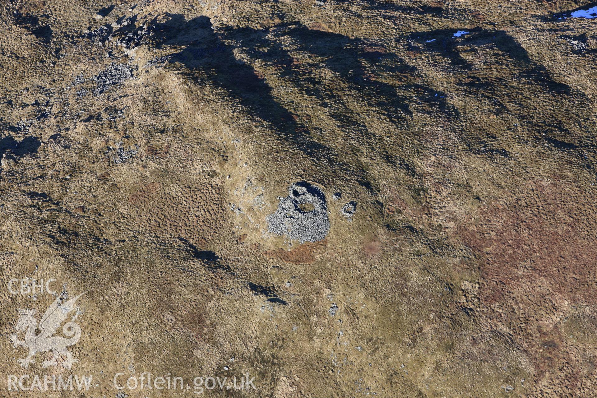 RCAHMW colour oblique photograph of Carn Owen, Cerrig yr Hafan. Taken by Toby Driver on 08/03/2010.