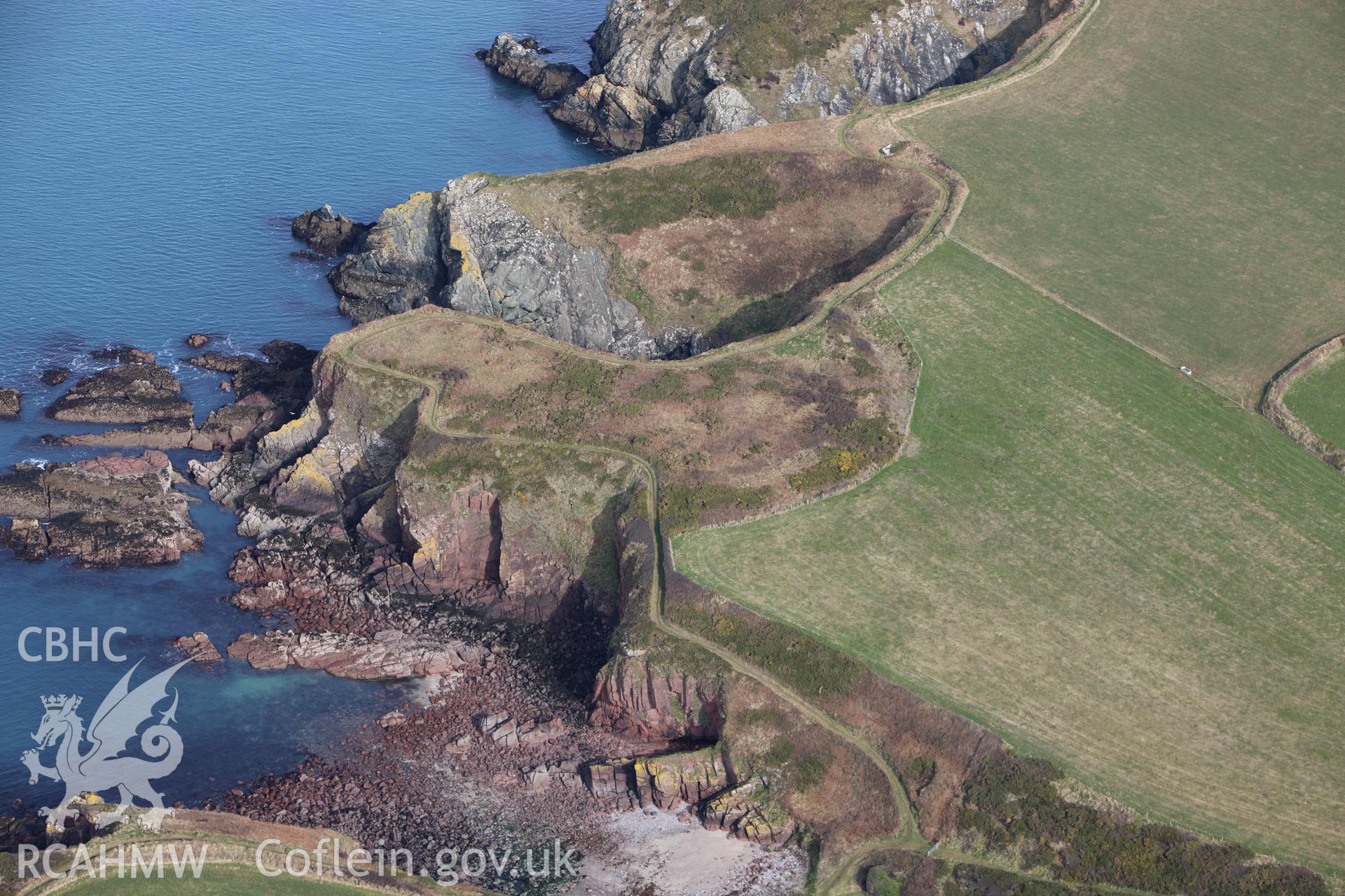 RCAHMW colour oblique aerial photograph of Mill Haven Rath. Taken on 02 March 2010 by Toby Driver