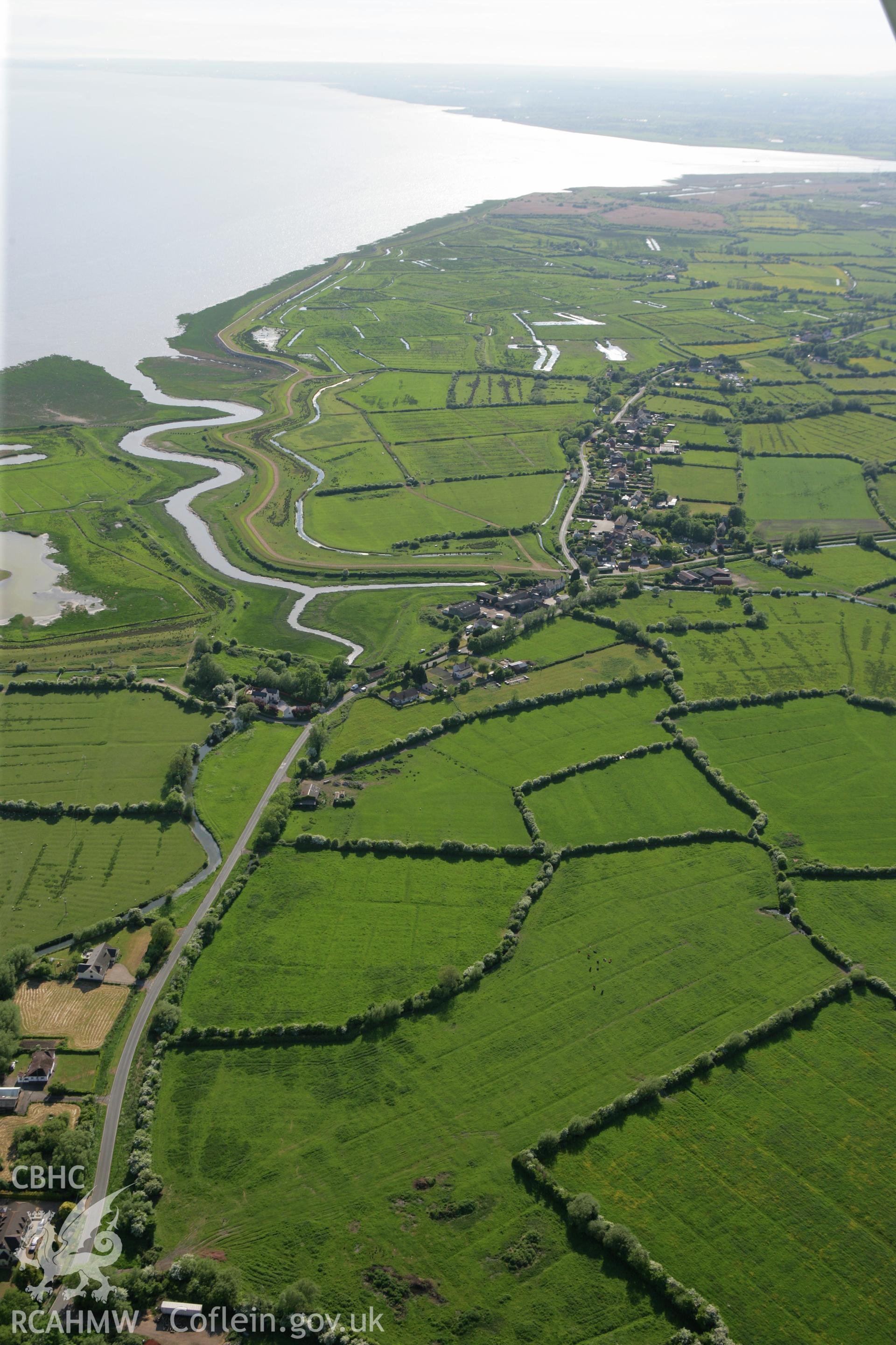 RCAHMW colour oblique photograph of Goldcliff village, from the east. Taken by Toby Driver on 24/05/2010.