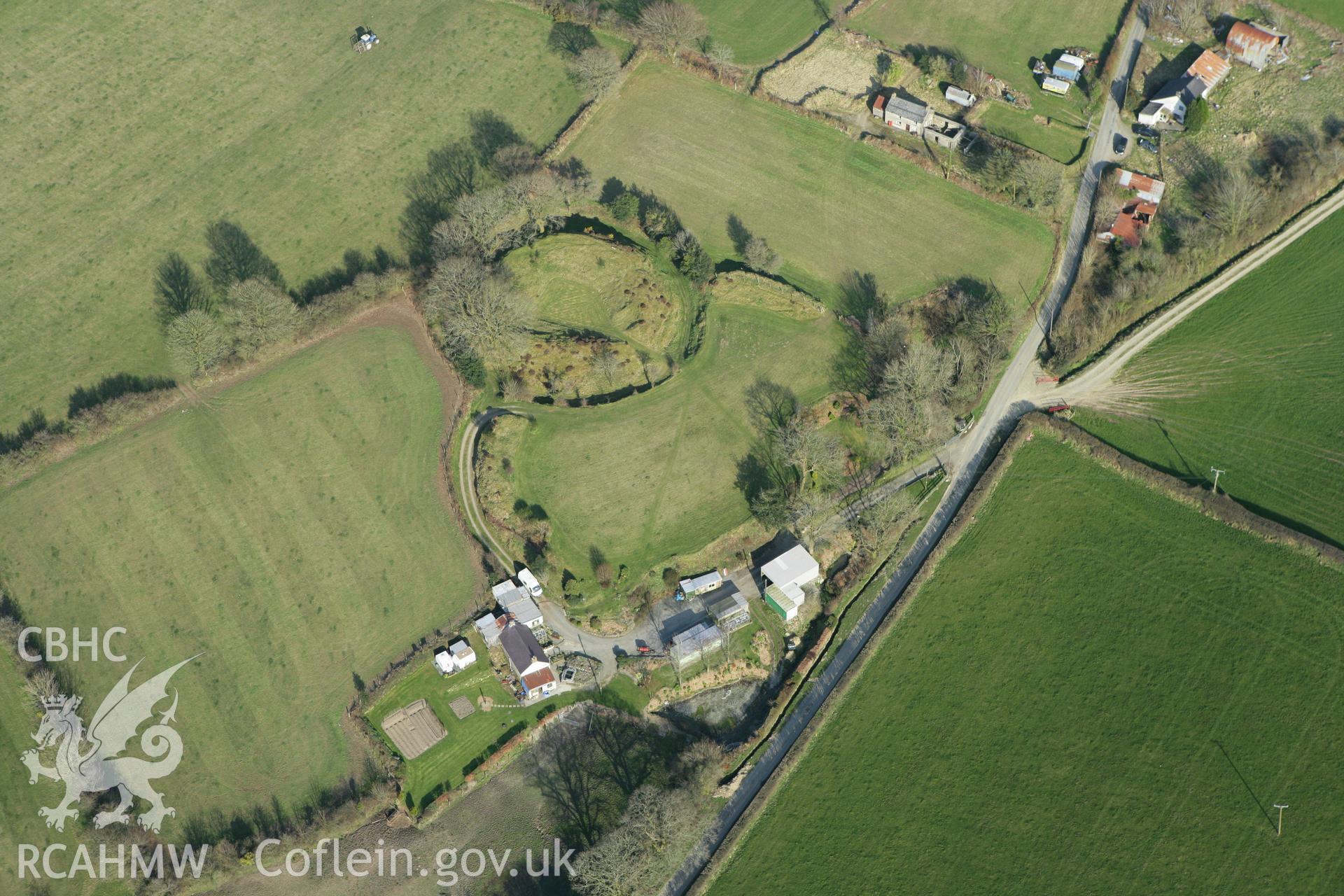 RCAHMW colour oblique aerial photograph of Castell Crychydd. Taken on 13 April 2010 by Toby Driver