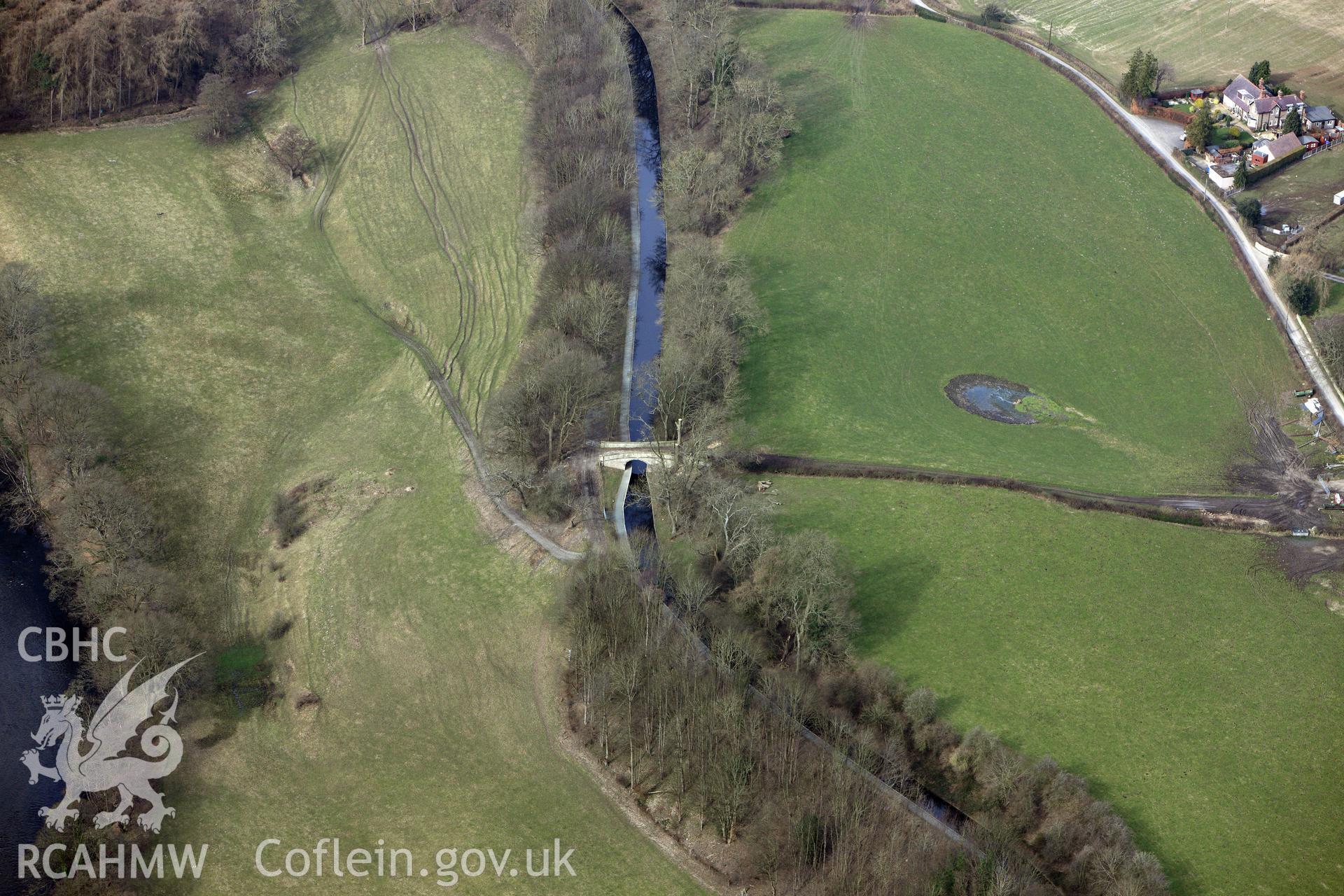 Bryn-Ceirch Bridge no. 36, crossing the Llangollen canal west of Froncysyllte. Oblique aerial photograph taken during the Royal Commission?s programme of archaeological aerial reconnaissance by Toby Driver on 28th February 2013.