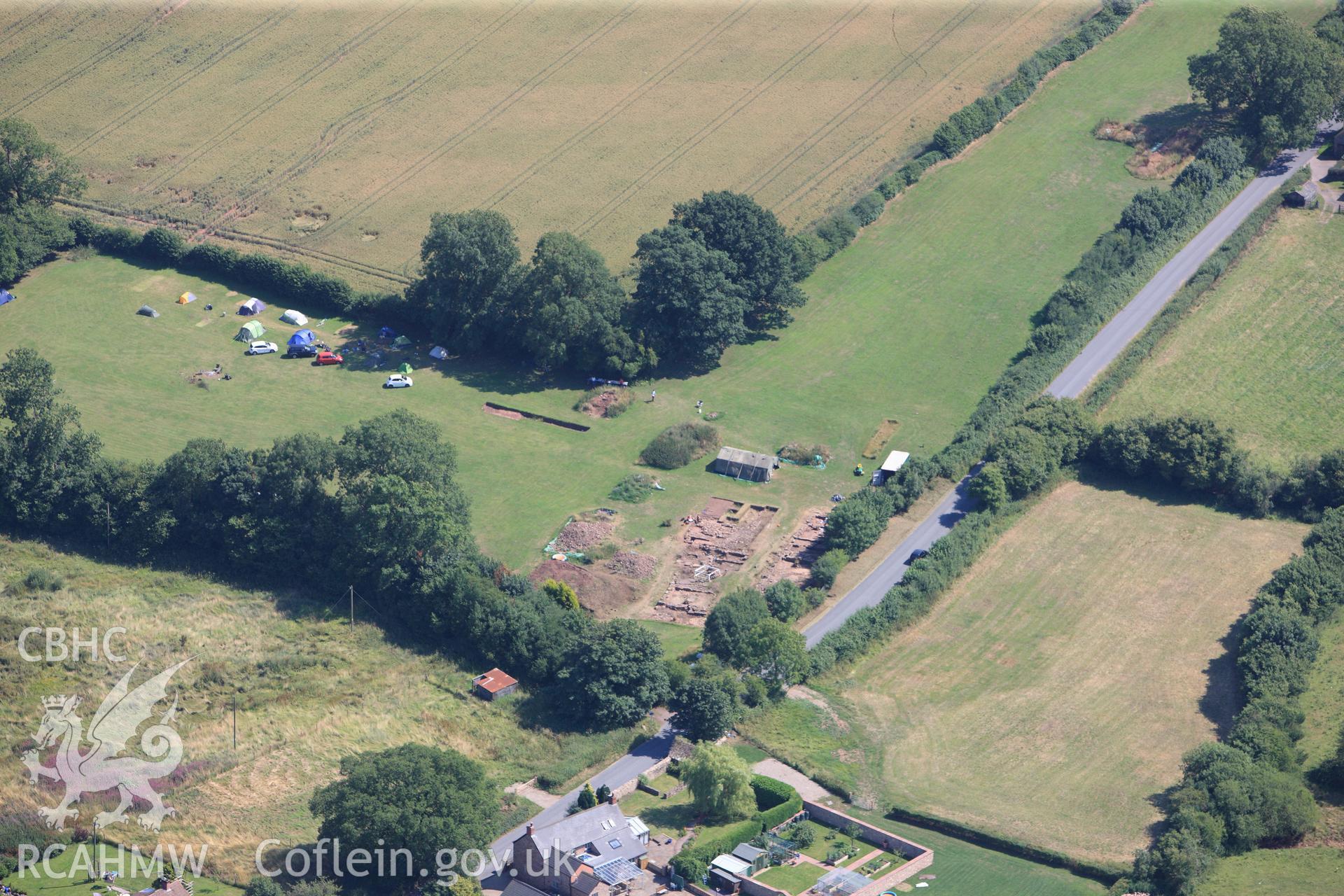 Excavations immediately south of Trellech shrunken medieval village. Oblique aerial photograph taken during the Royal Commission?s programme of archaeological aerial reconnaissance by Toby Driver on 1st August 2013.