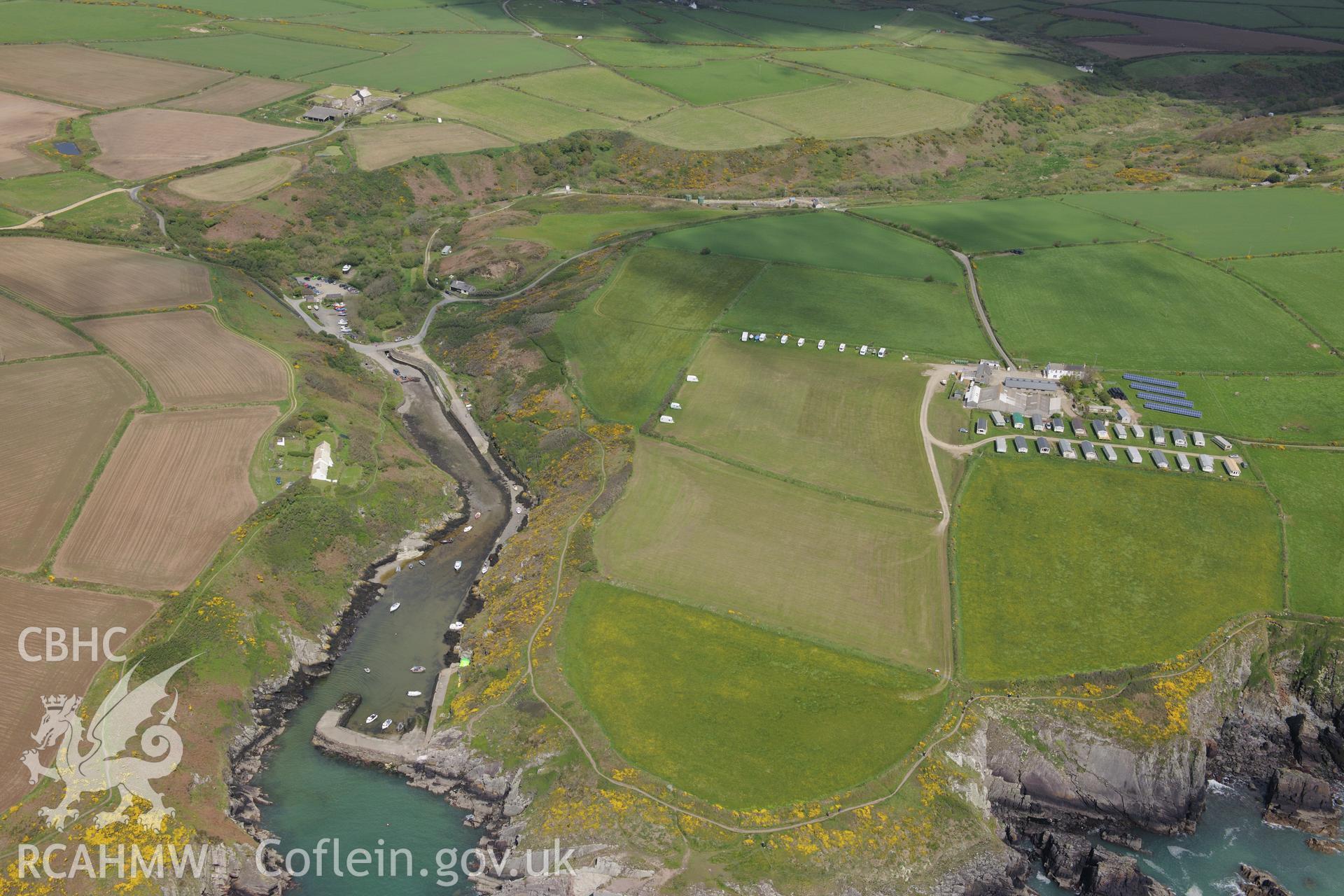 Porthclais harbour and lime kilns near St. David's. Oblique aerial photograph taken during the Royal Commission's programme of archaeological aerial reconnaissance by Toby Driver on 13th May 2015.