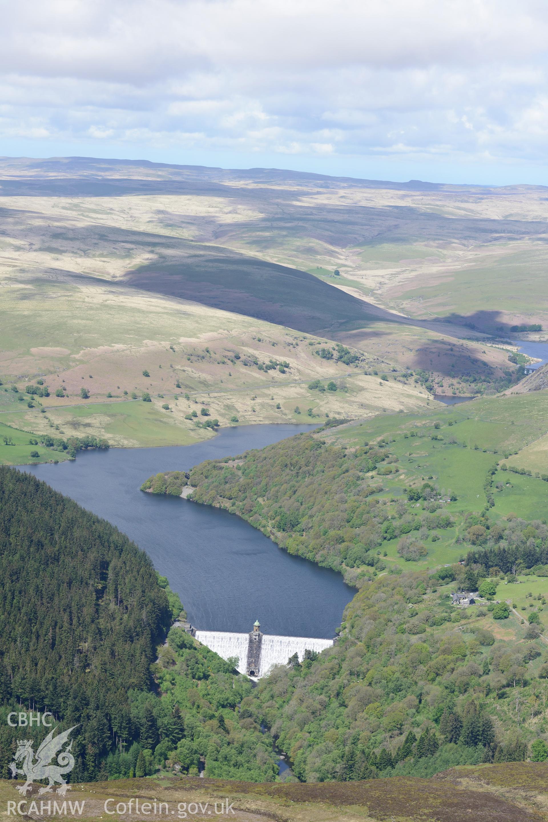 Pen-y-Garreg reservoir, dam and valve tower. Oblique aerial photograph taken during the Royal Commission's programme of archaeological aerial reconnaissance by Toby Driver on 3rd June 2015.