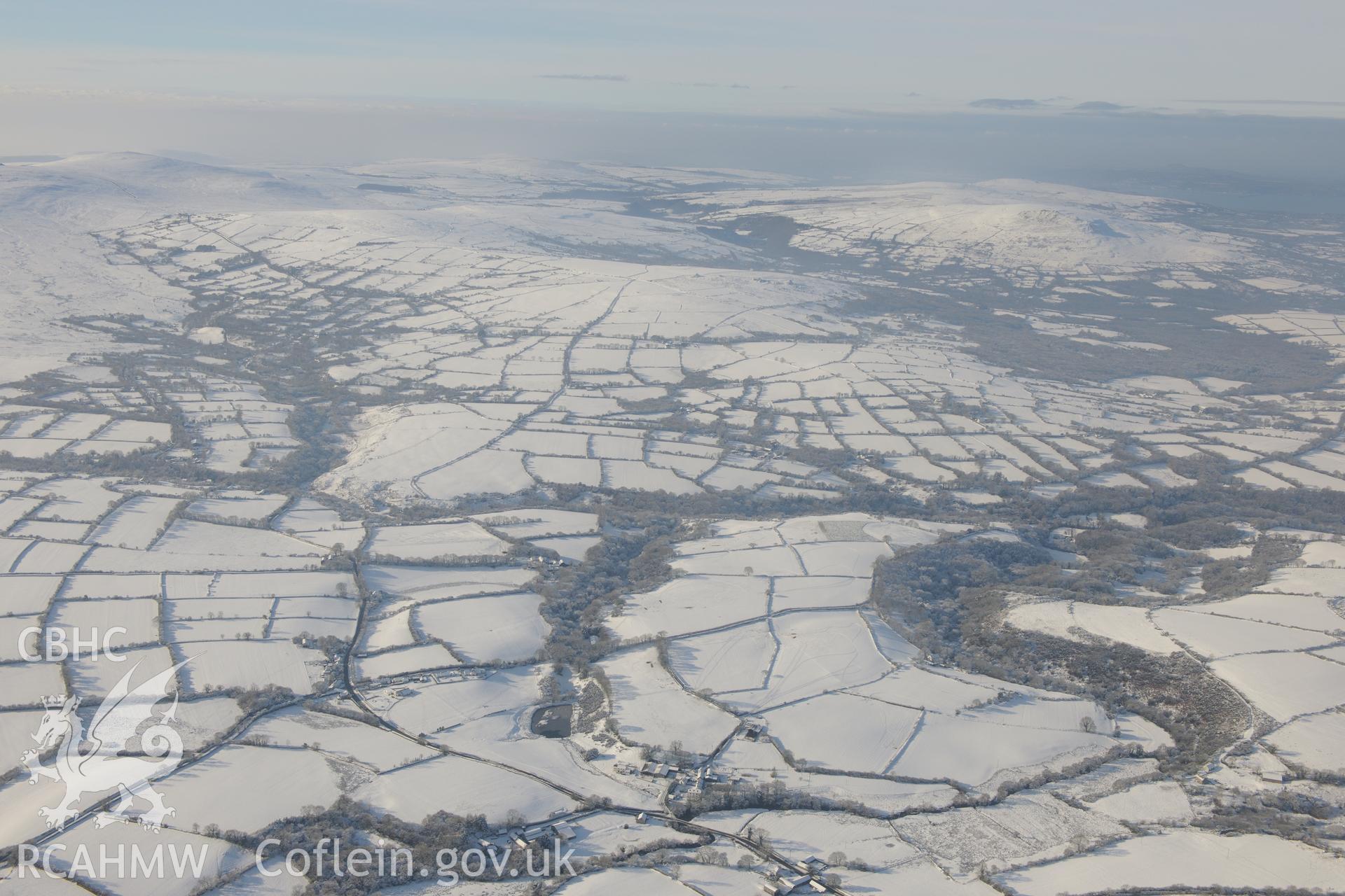 Craig Rhosyfelin bluestone outcrop, south west of Cardigan. Oblique aerial photograph taken during the Royal Commission?s programme of archaeological aerial reconnaissance by Toby Driver on 24th January 2013.