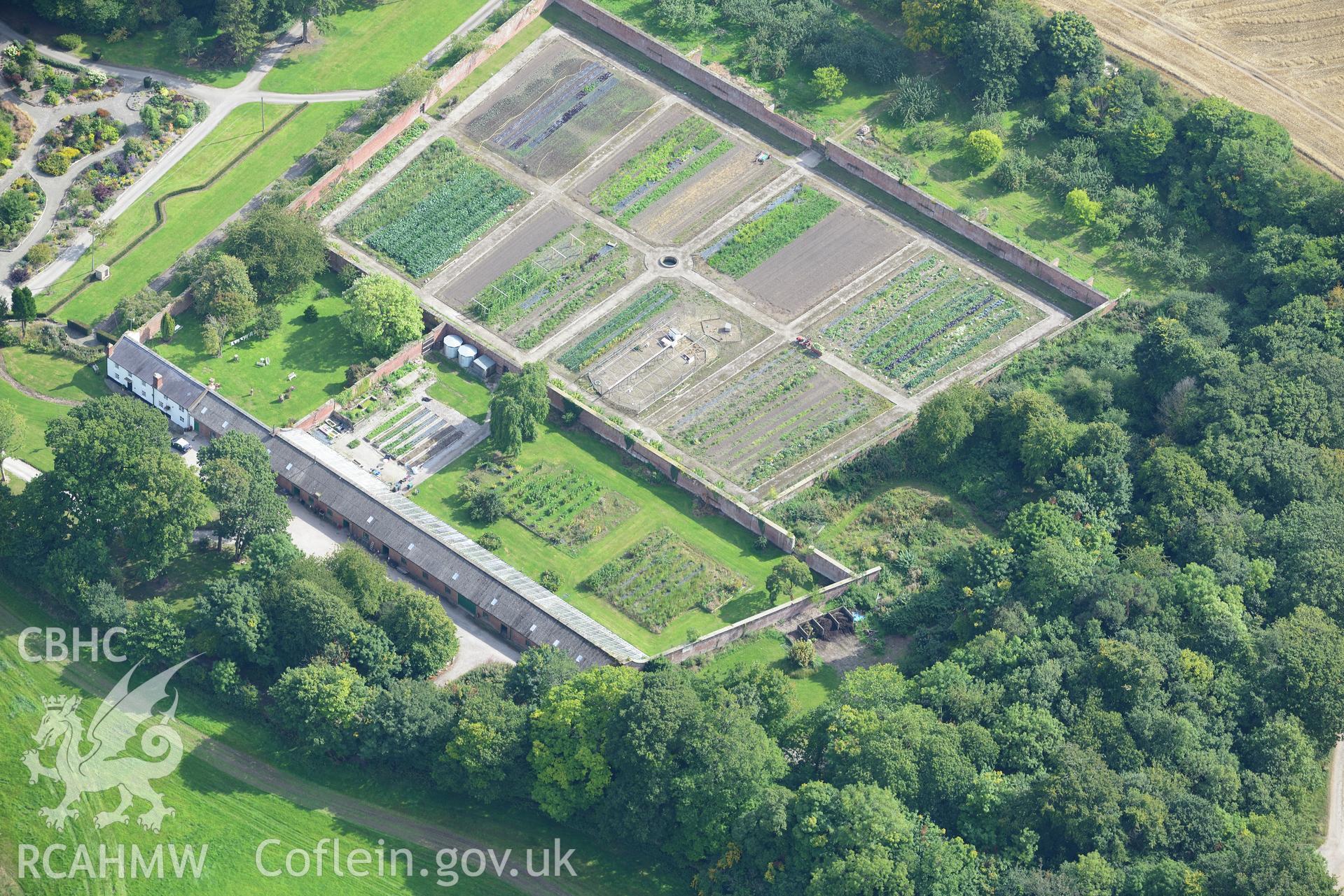 Mostyn Hall park and gardens, Mostyn. Oblique aerial photograph taken during the Royal Commission's programme of archaeological aerial reconnaissance by Toby Driver on 11th September 2015.