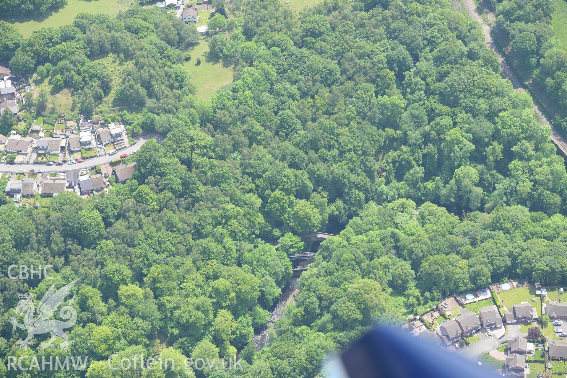 Greenfield Bridge, part of the Merthyr Tramroad, Quaker's Yard. Oblique aerial photograph taken during the Royal Commission's programme of archaeological aerial reconnaissance by Toby Driver on 11th June 2015.