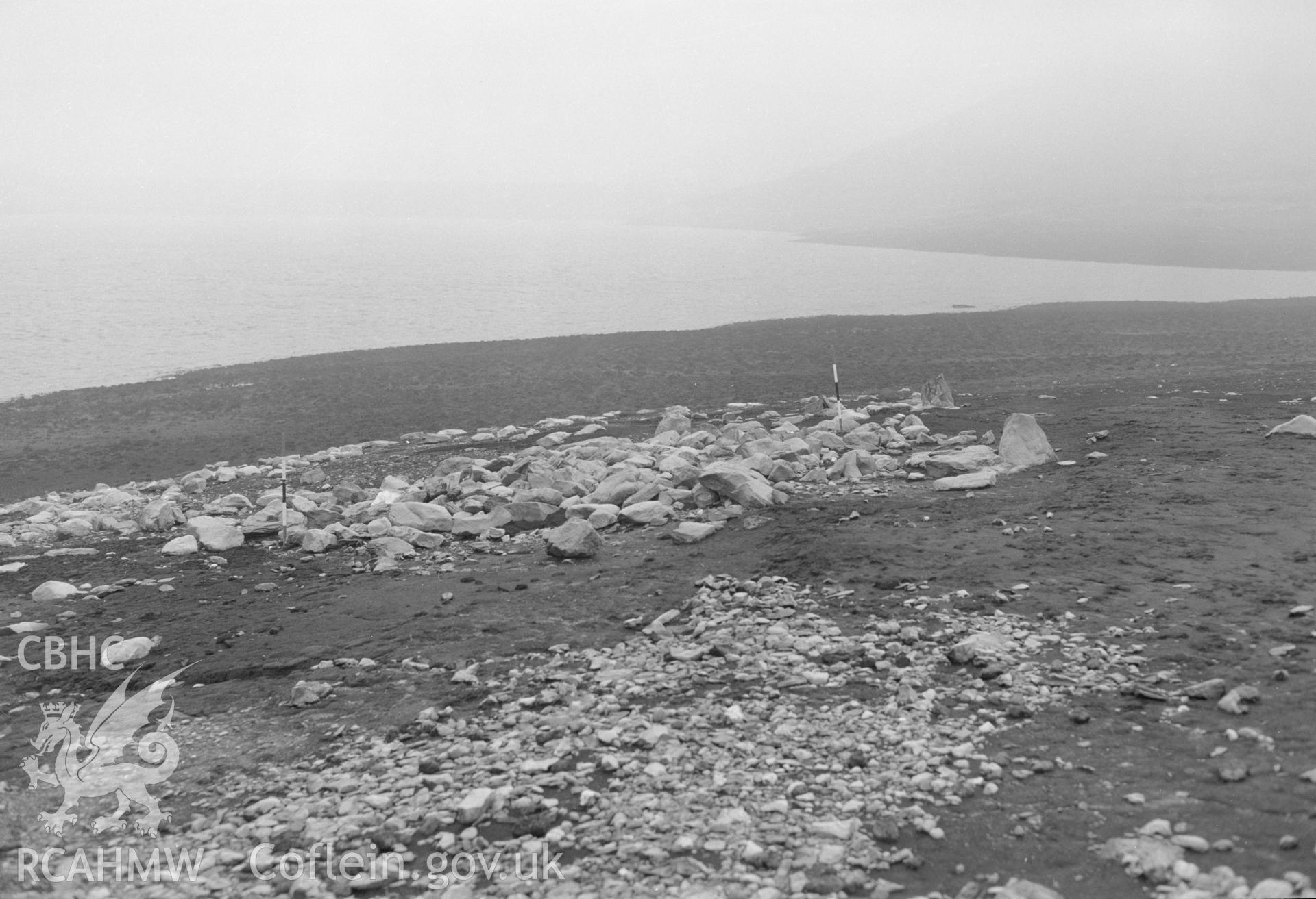 Digital copy of a black and white nitrate negative showing a view of Aber Camddwr cairn, taken by RCAHMW, undated.