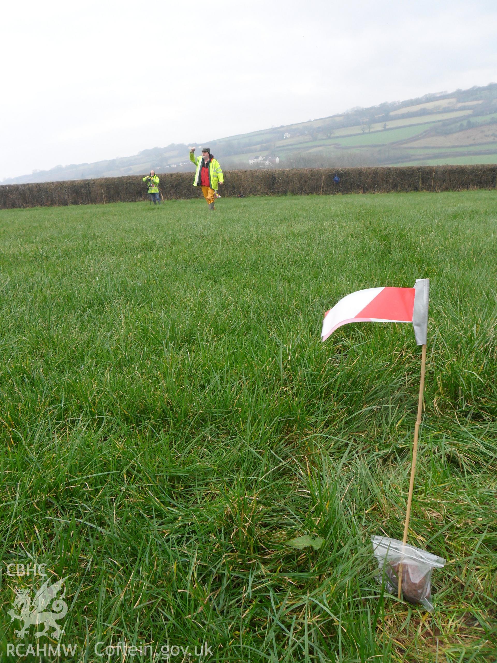 Digital colour photograph of archaeological investigation at Maes Gwenllian battlefield. From report no. 1050 - Maes Gwenllian battlefield, part of the Welsh Battlefield Metal Detector Survey, carried out by Archaeology Wales.