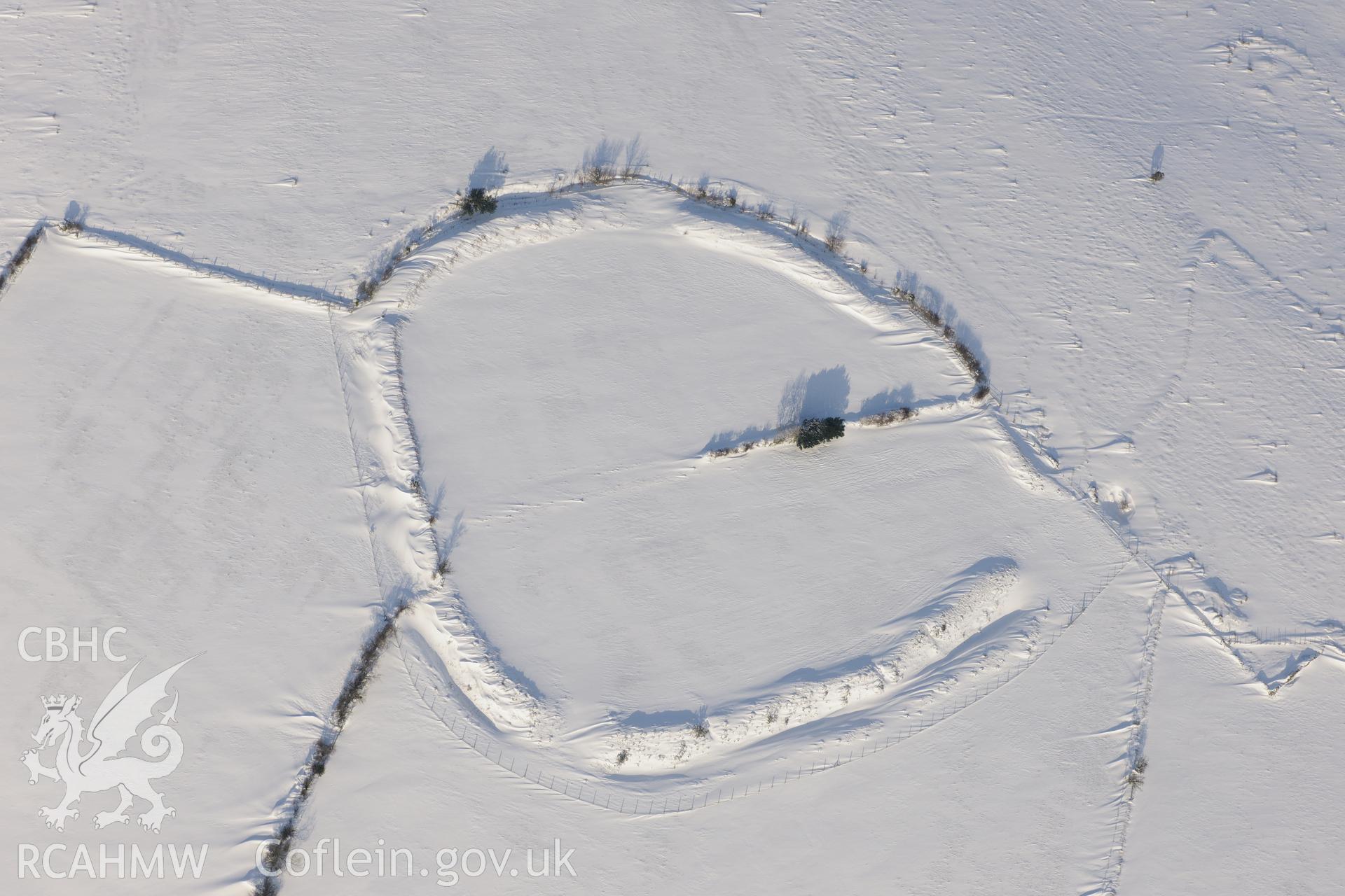 Coedcae Gaer hillfort, north east of Bridgend. Oblique aerial photograph taken during the Royal Commission?s programme of archaeological aerial reconnaissance by Toby Driver on 24th January 2013.