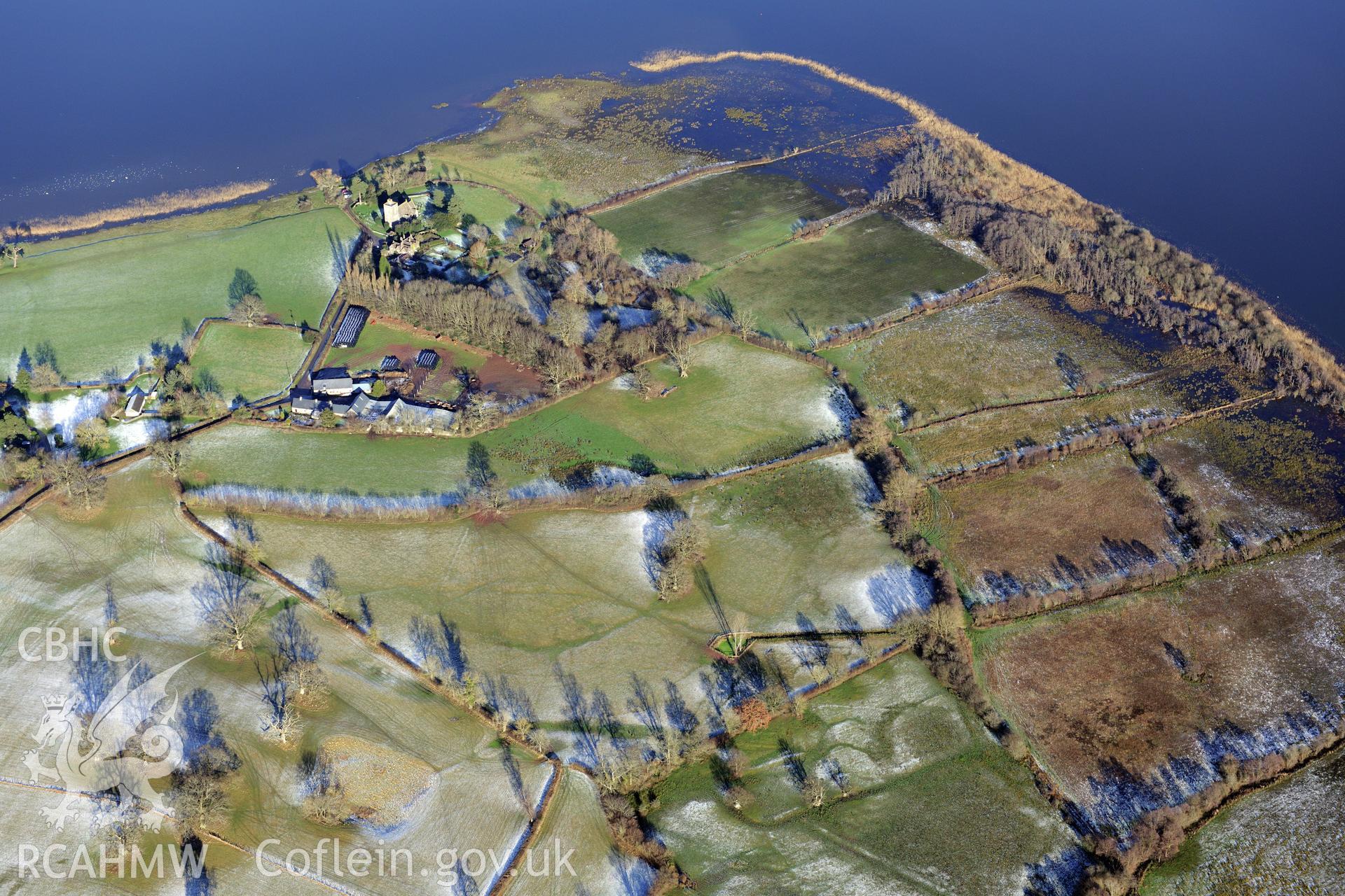 St. Gastyn's church, the village of Llangasty-Talyllyn and surrounding fields, south east of Brecon. Oblique aerial photograph taken during the Royal Commission?s programme of archaeological aerial reconnaissance by Toby Driver on 15th January 2013.