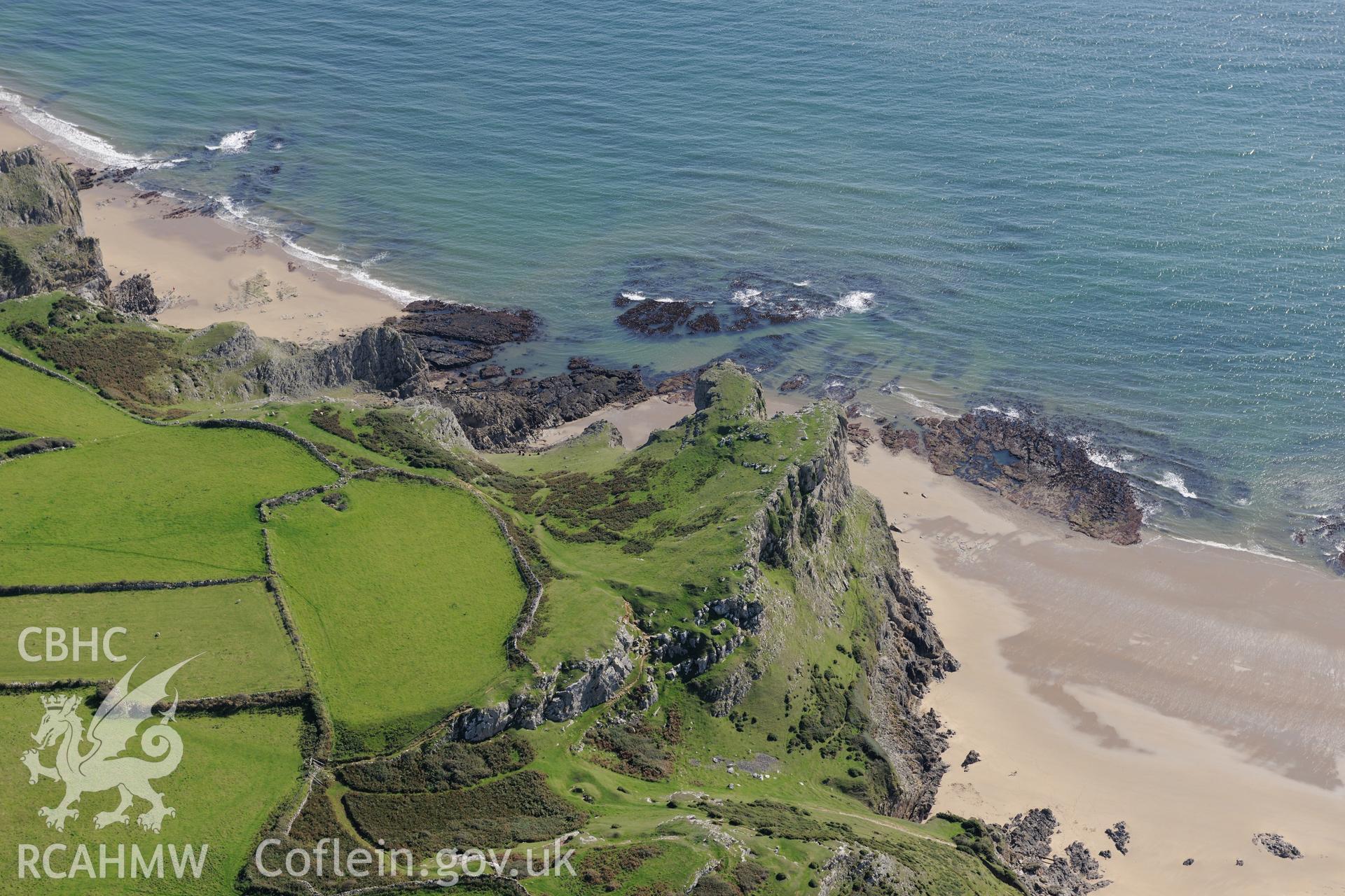 Lewes Castle promontory fort above Fall Bay, south of Rhossili, on the western coast of the Gower Peninsula. Oblique aerial photograph taken during the Royal Commission's programme of archaeological aerial reconnaissance by Toby Driver on 30th September 2015.