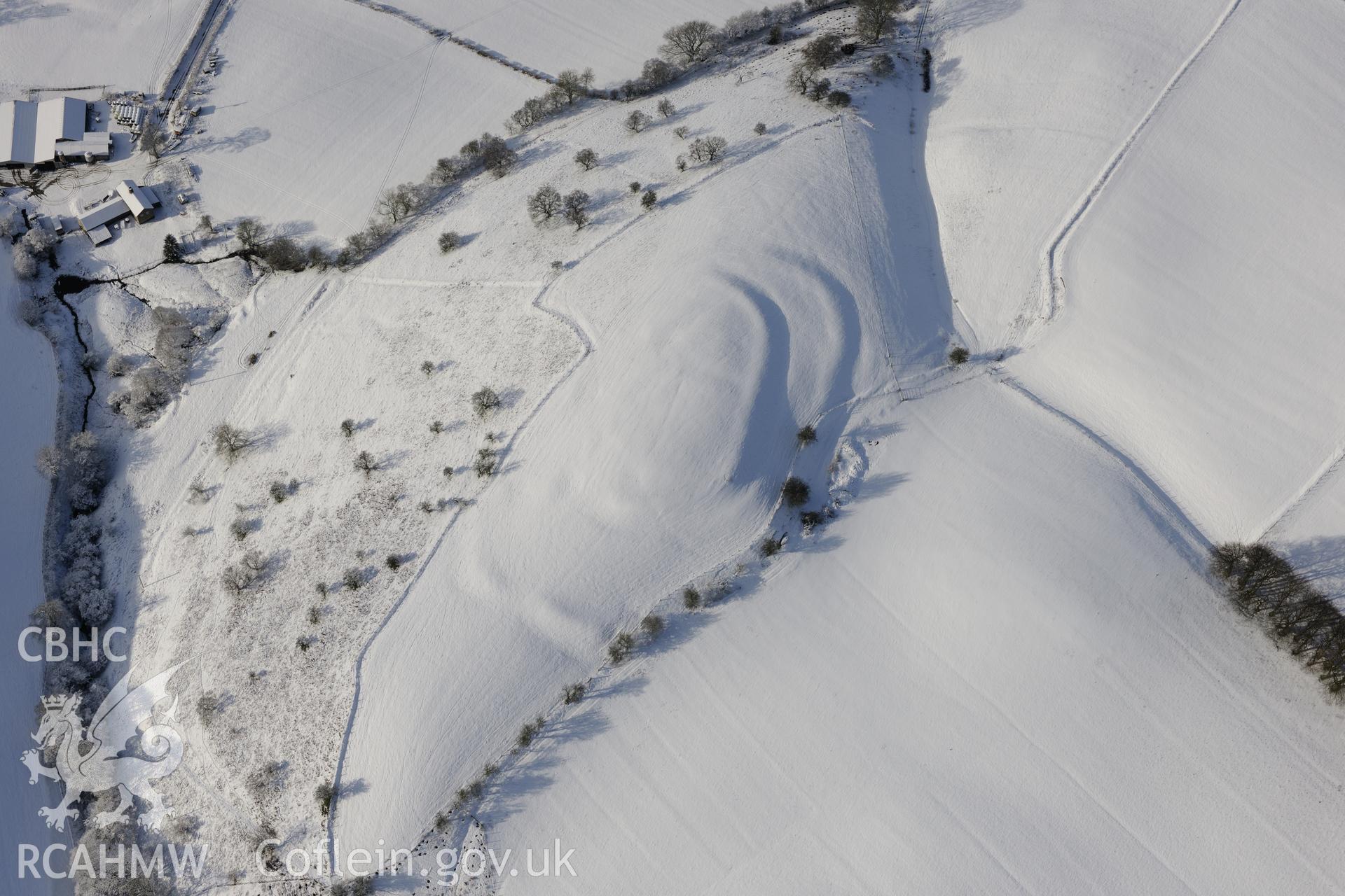 Wern Camp defended enclosure, Glascwm, north east of Builth Wells. Oblique aerial photograph taken during the Royal Commission?s programme of archaeological aerial reconnaissance by Toby Driver on 15th January 2013.