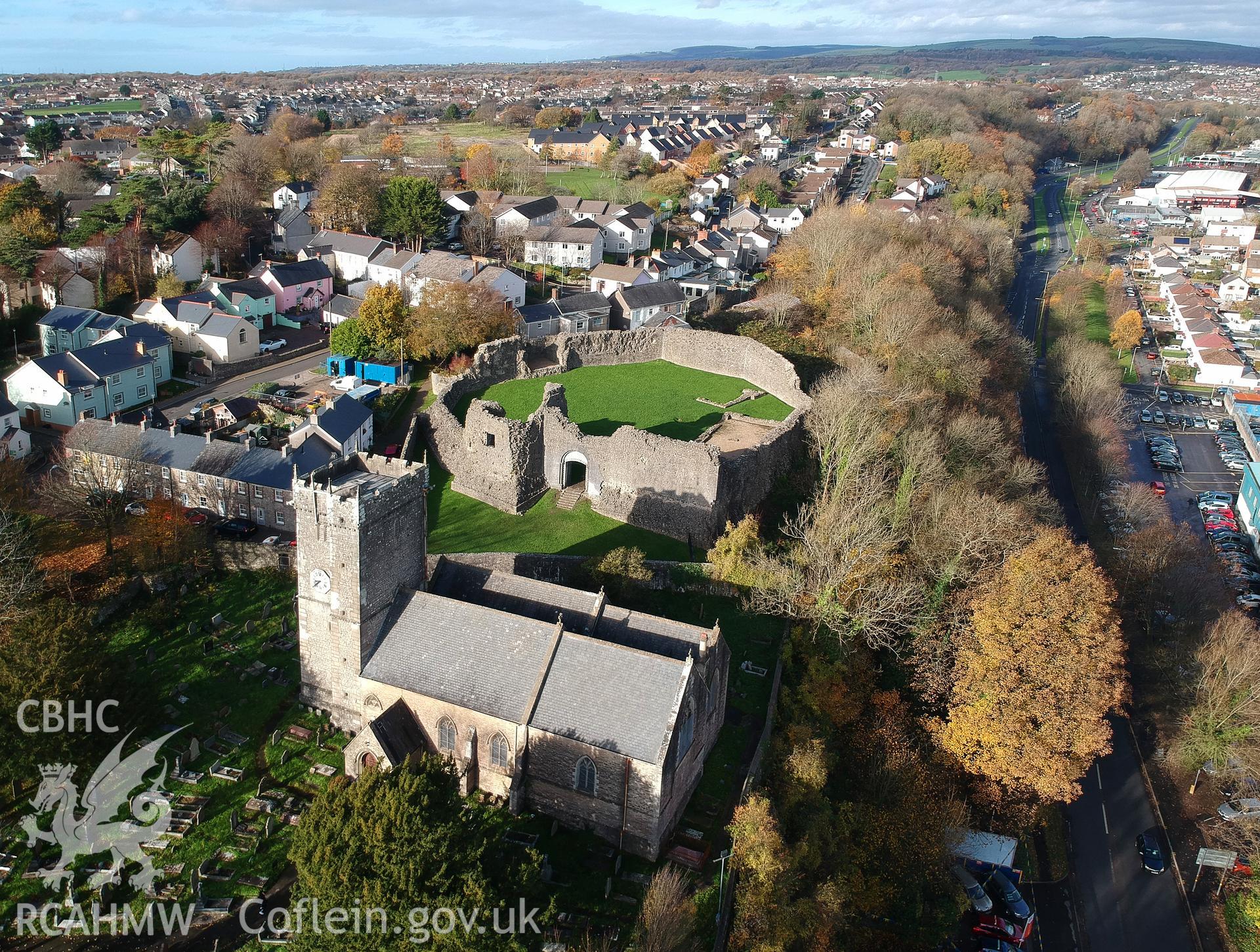 View from the south east of St. Illtyd's church and Newcastle Castle beyond, Bridgend. Colour photograph taken by Paul R. Davis on 14th November 2018.