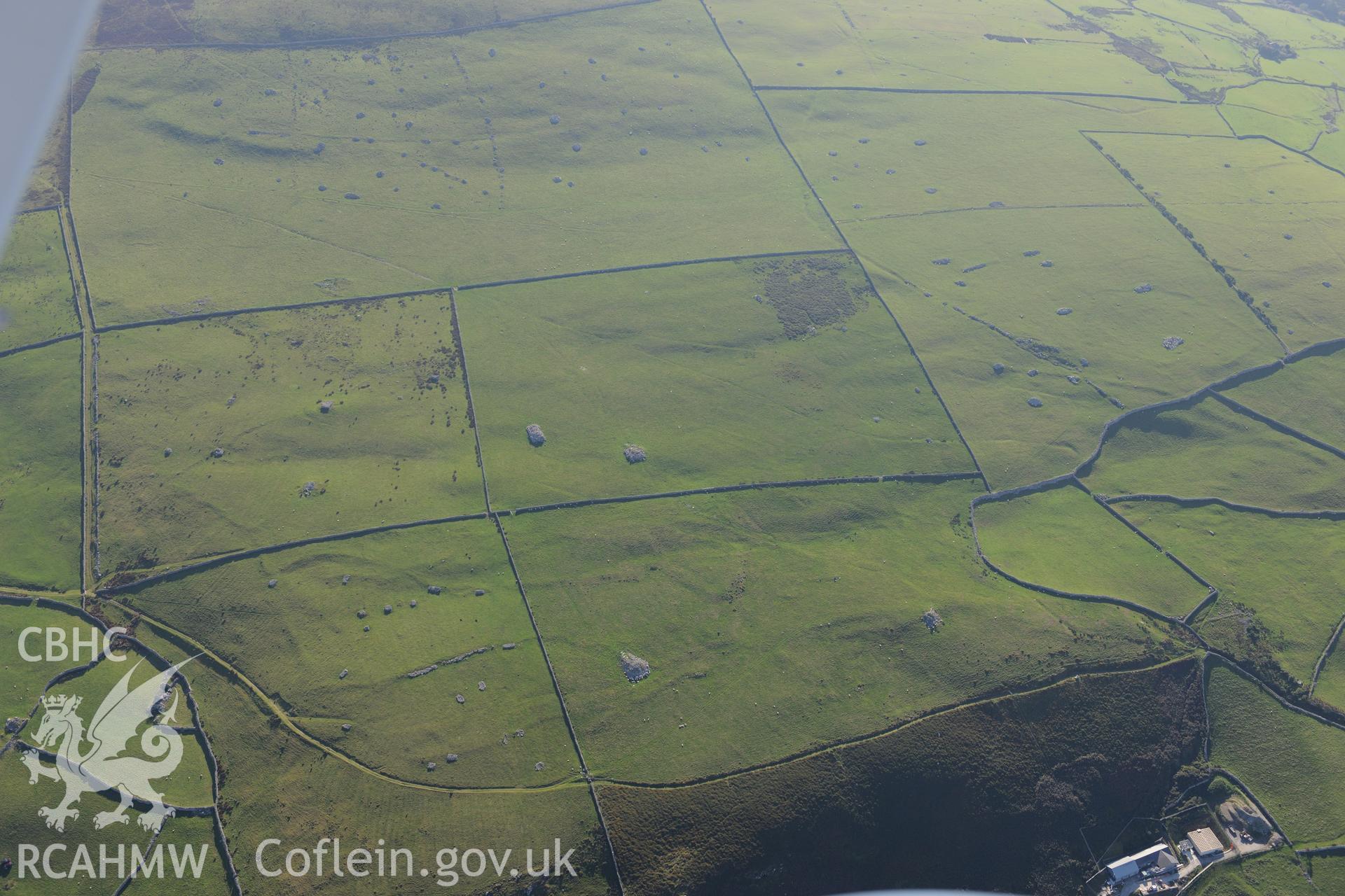 Parth-y-Gwddwch homestead and Gwastadgoed cairns and standing stones, near Llwyngwril. Oblique aerial photograph taken during the Royal Commission's programme of archaeological aerial reconnaissance by Toby Driver on 2nd October 2015.