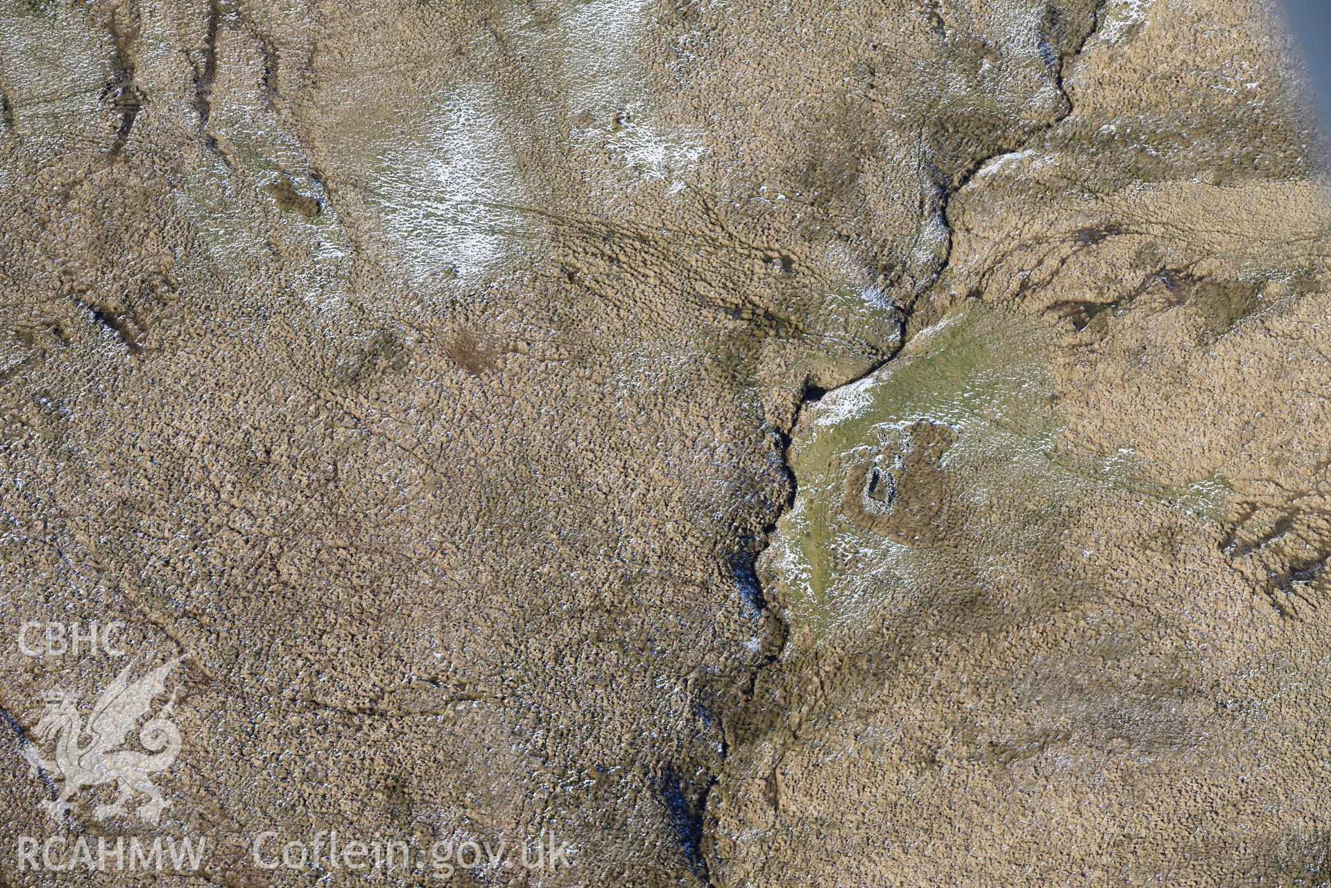 Blaen Brefi longhouse, south east of Tregaron. Oblique aerial photograph taken during the Royal Commission's programme of archaeological aerial reconnaissance by Toby Driver on 4th February 2015.
