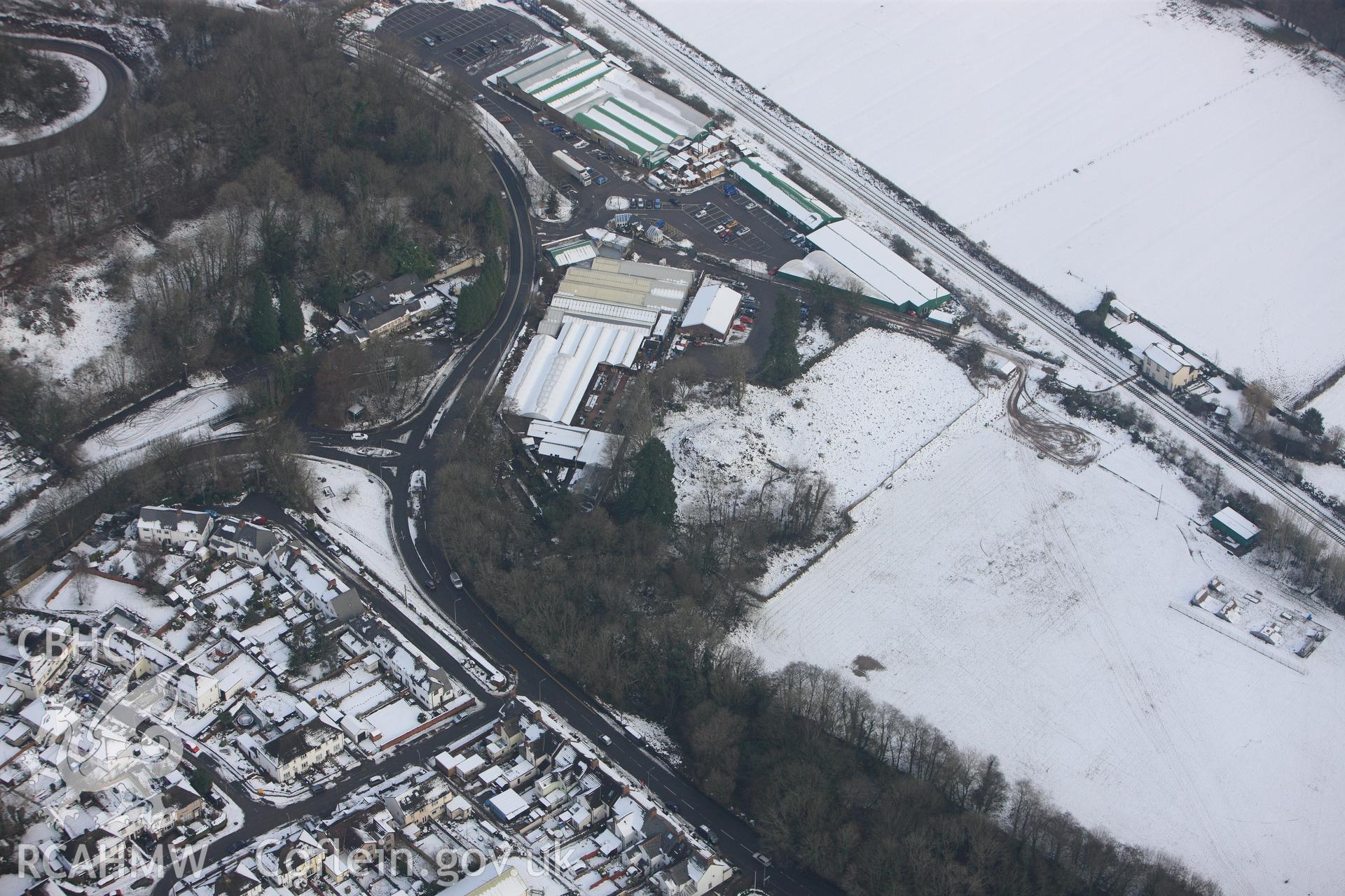 Ty Nant motte, Morganstown, on the north western edge of Cardiff. Oblique aerial photograph taken during the Royal Commission?s programme of archaeological aerial reconnaissance by Toby Driver on 24th January 2013.