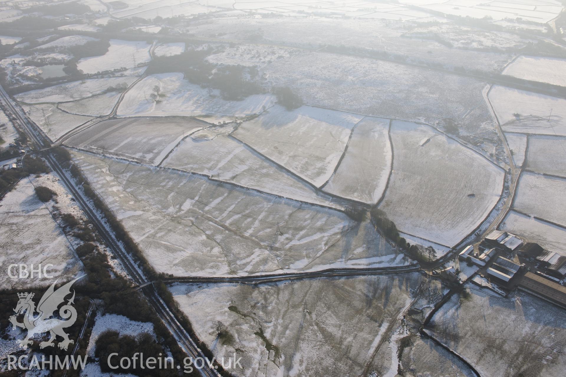 Stormy Grange and Stormy Farmhouse, south east of Pyle, Bridgend. Oblique aerial photograph taken during the Royal Commission?s programme of archaeological aerial reconnaissance by Toby Driver on 24th January 2013.