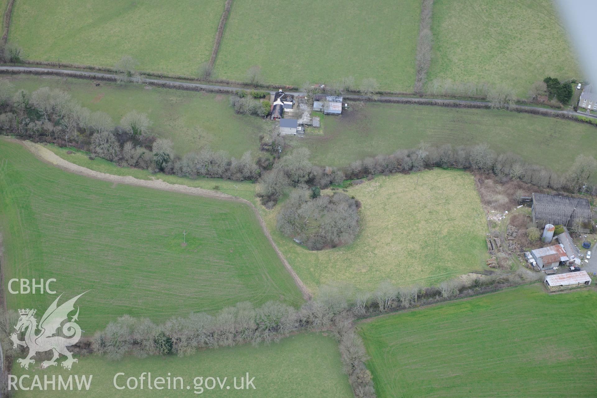 Castell Pistog motte, Llandyfriog, near Llandysul. Oblique aerial photograph taken during the Royal Commission's programme of archaeological aerial reconnaissance by Toby Driver on 13th March 2015.