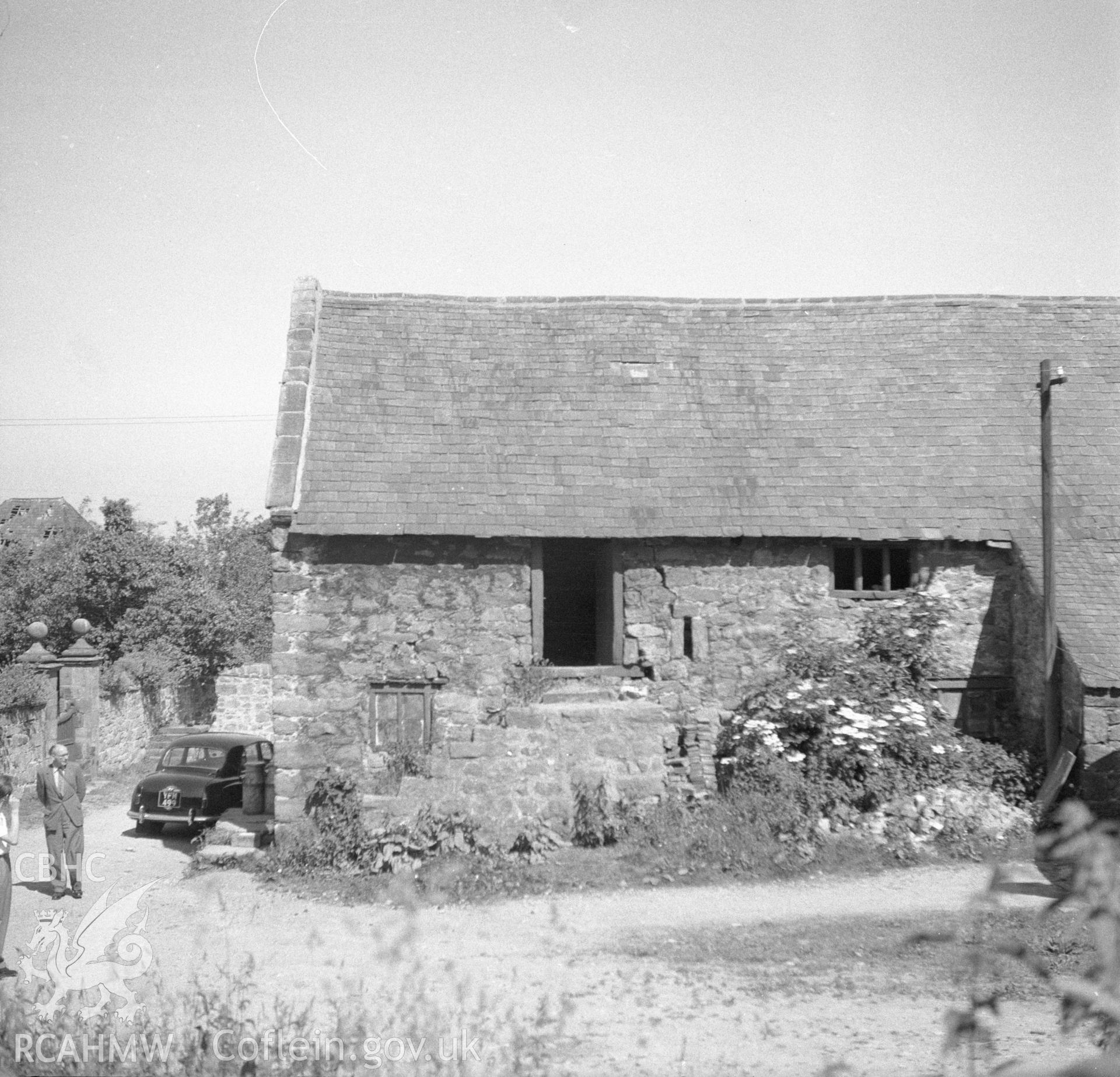 Digital copy of a nitrate negative showing exterior view of outbuilding at Nerquis Hall.