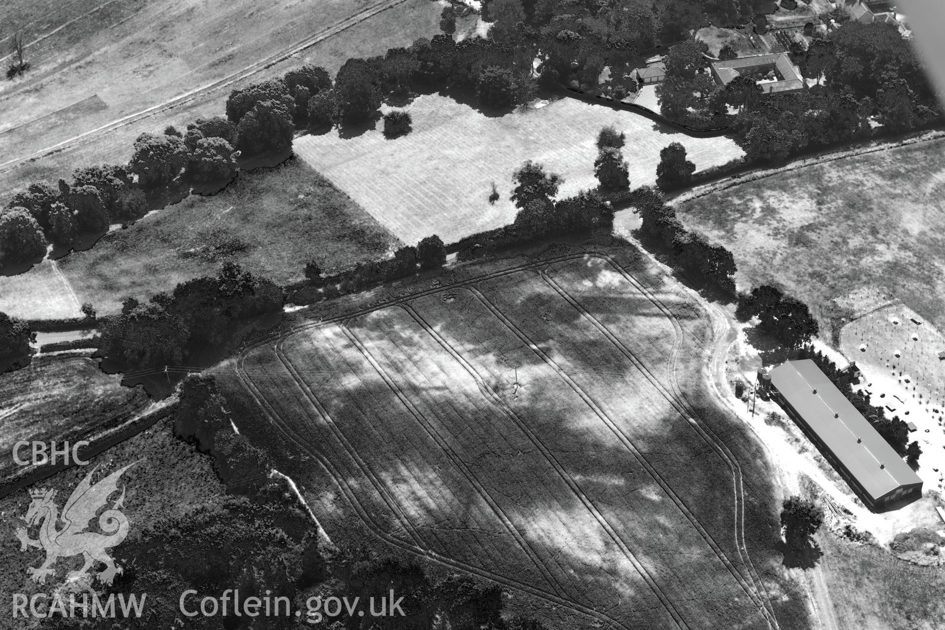 Talocher Farm Roman Fort, Wonastow, south west of Monmouth. Oblique aerial photograph taken during the Royal Commission?s programme of archaeological aerial reconnaissance by Toby Driver on 1st August 2013.