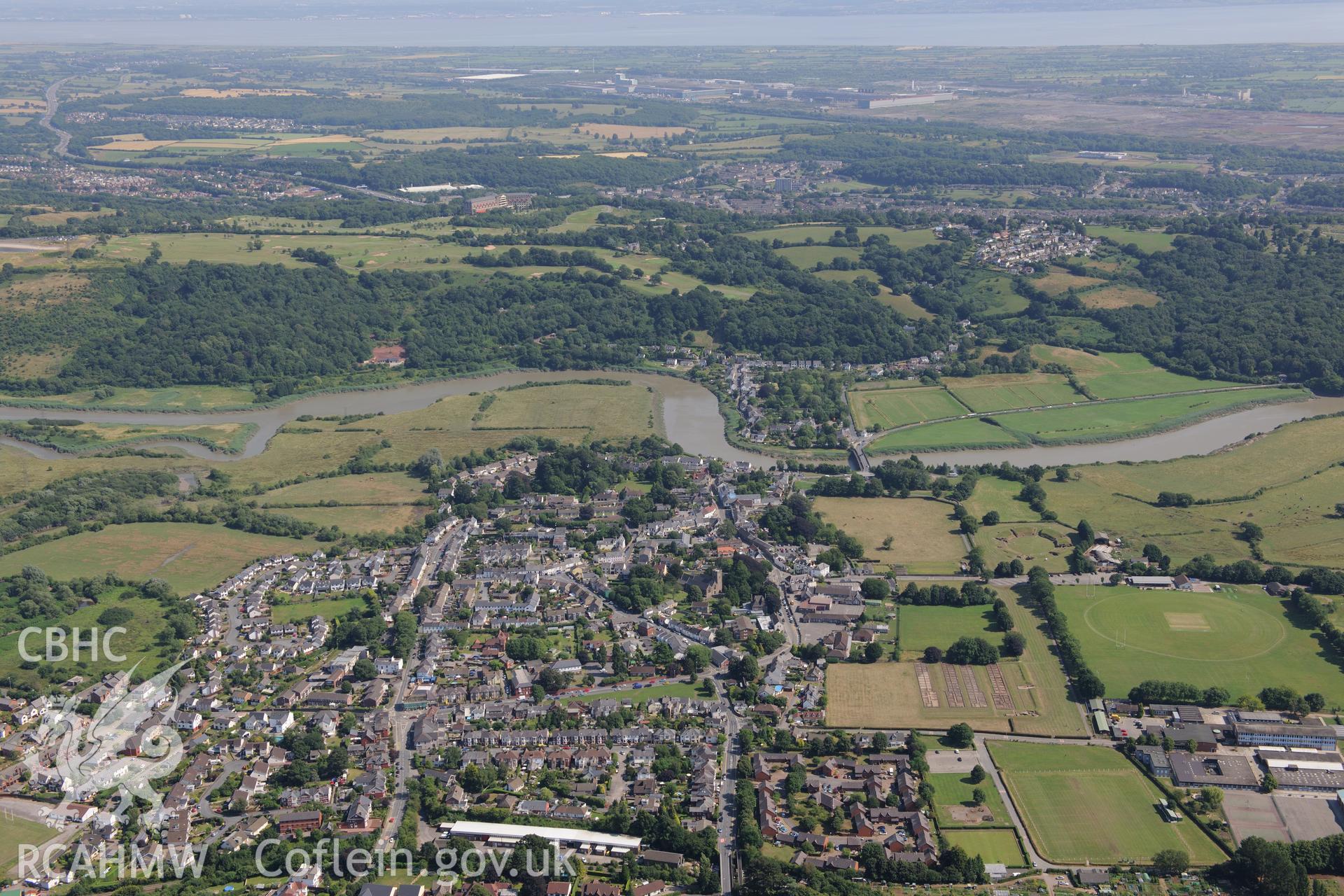 Roman barracks in Prysg Field, Roman parade ground in area under Broadway playing fields, and the town of Caerleon, north east of Newport. Oblique aerial photograph taken during the Royal Commission?s programme of archaeological aerial reconnaissance by Toby Driver on 1st August 2013.