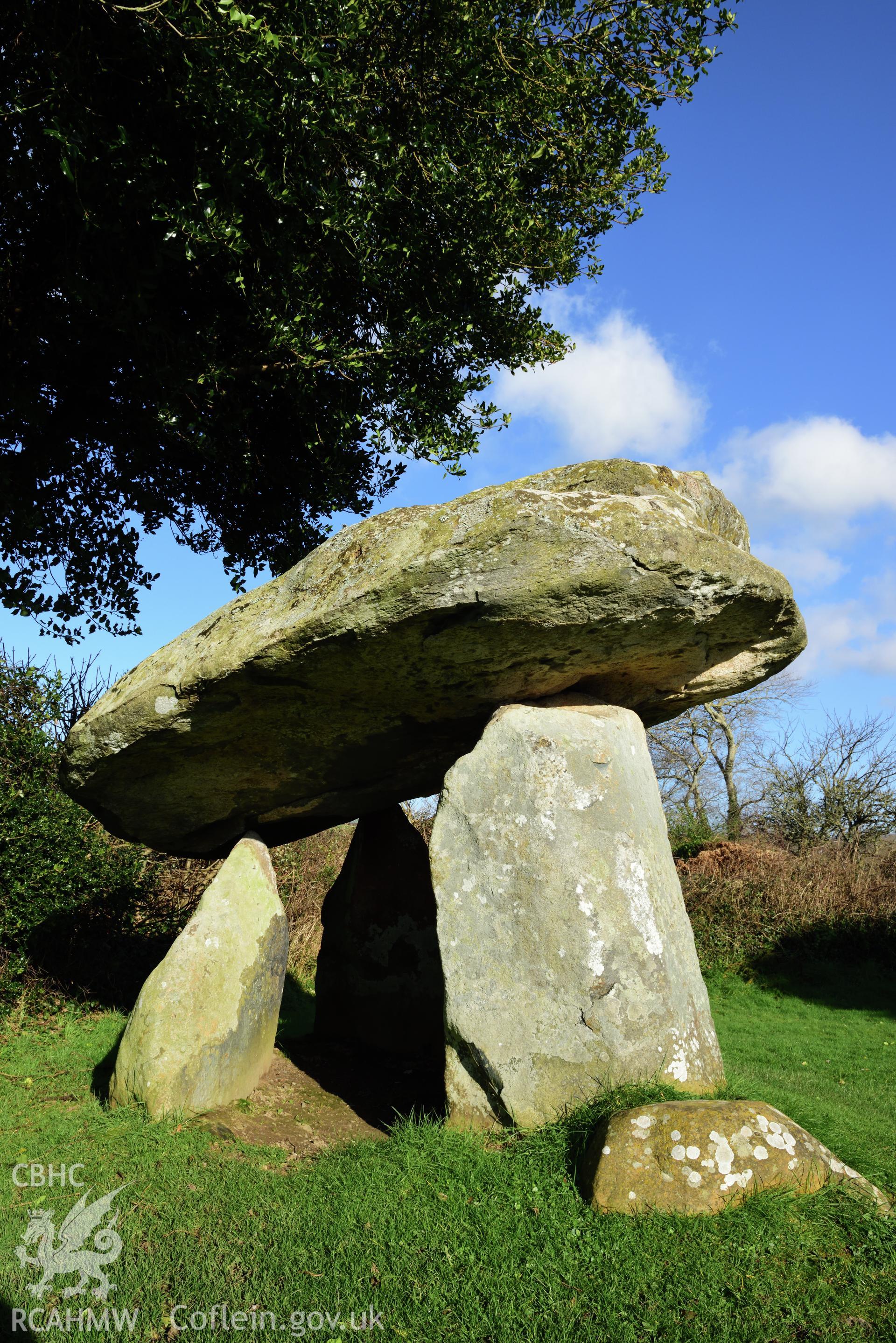 Royal Commission photo survey of Carreg Coetan chambered tomb in winter light, by Toby Driver