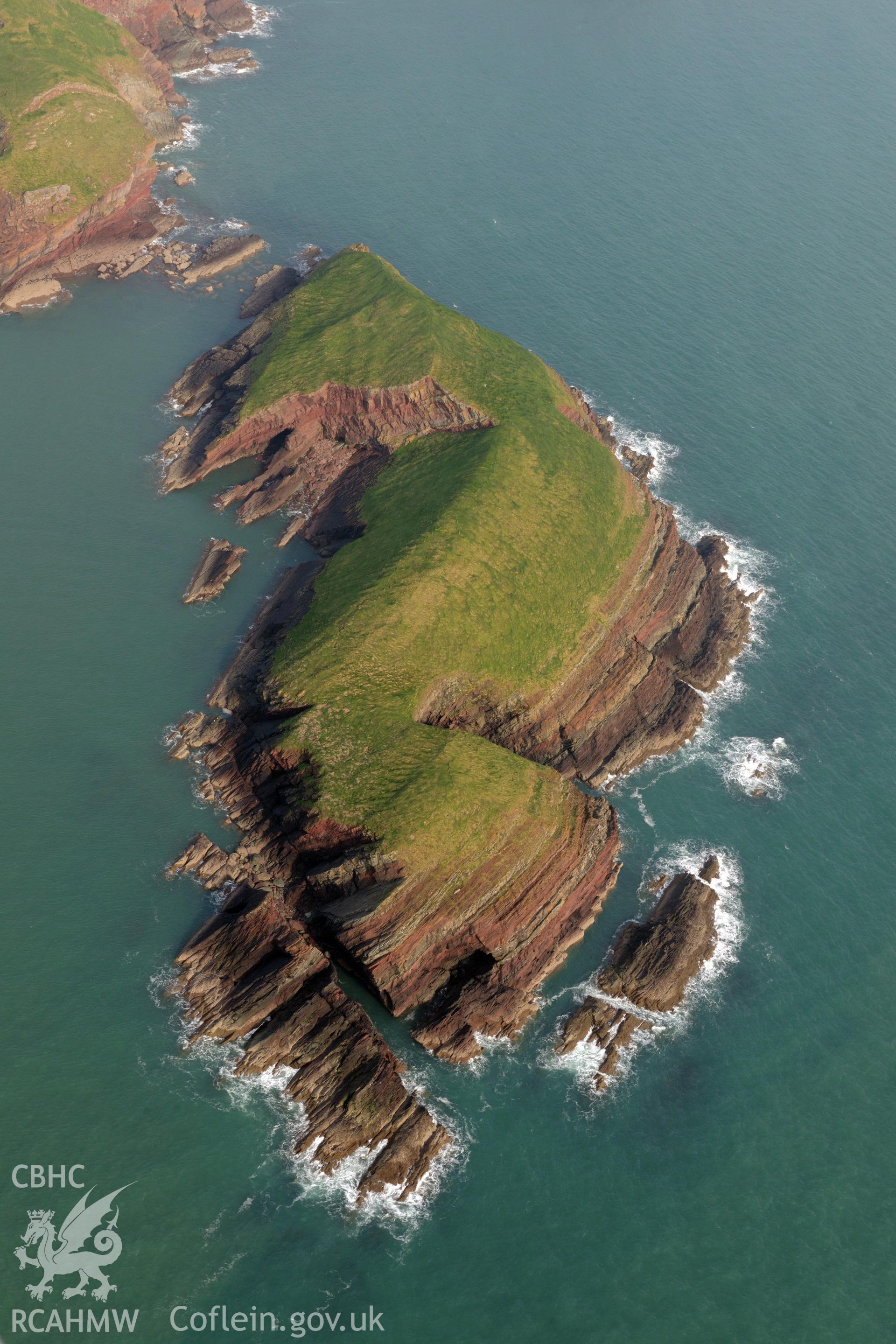 Royal Commission aerial photograph of Sheep Island taken on 27th March 2017. Baseline aerial reconnaissance survey for the CHERISH Project. ? Crown: CHERISH PROJECT 2019. Produced with EU funds through the Ireland Wales Co-operation Programme 2014-2020. All material made freely available through the Open Government Licence.