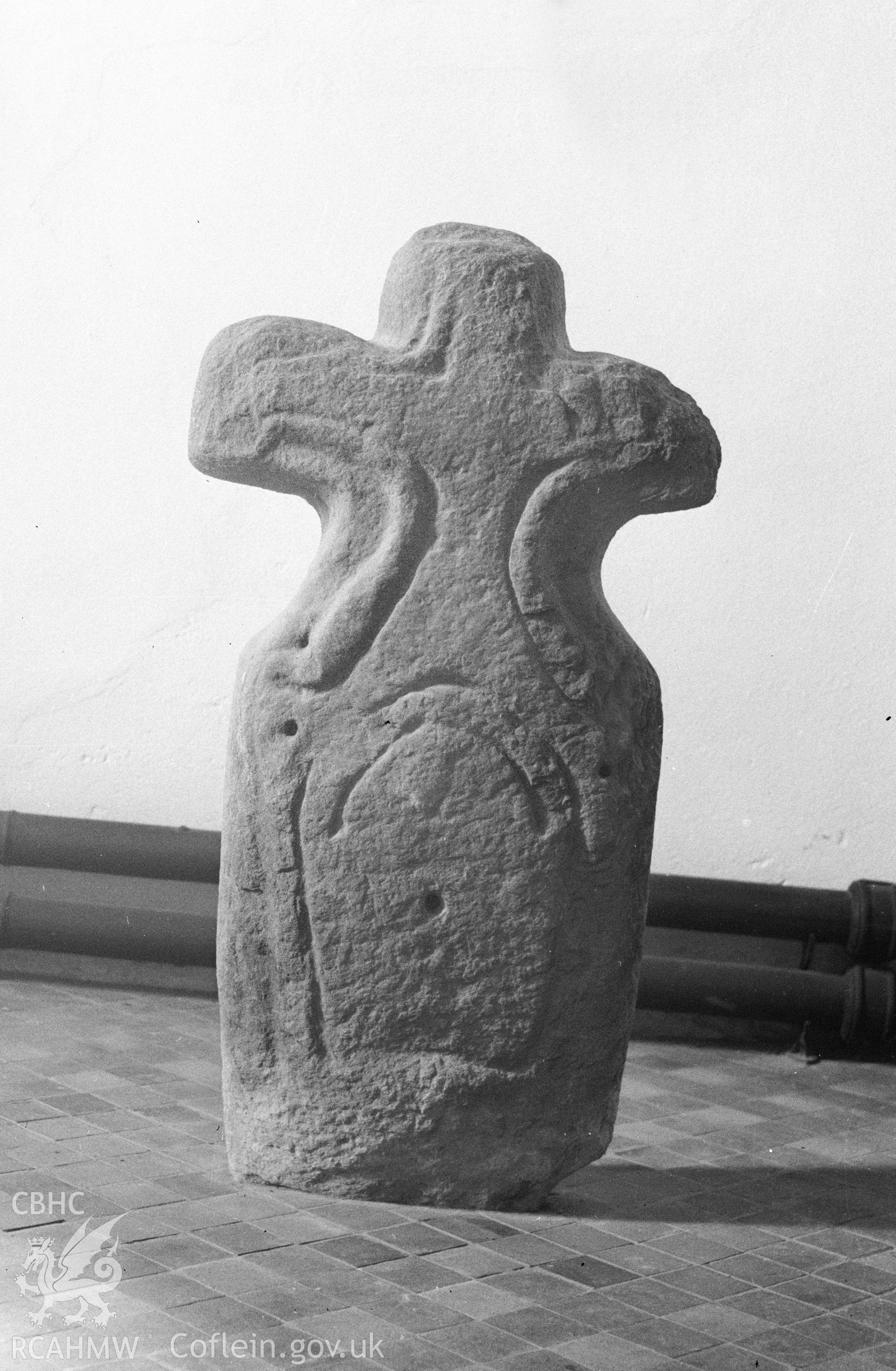 Digital copy of a nitrate negative showing early medieval inscribed cross in the south trancept of St Padarn's Church, Llanbadarn Fawr, Ceredigion. From the National Building Record Postcard Collection.