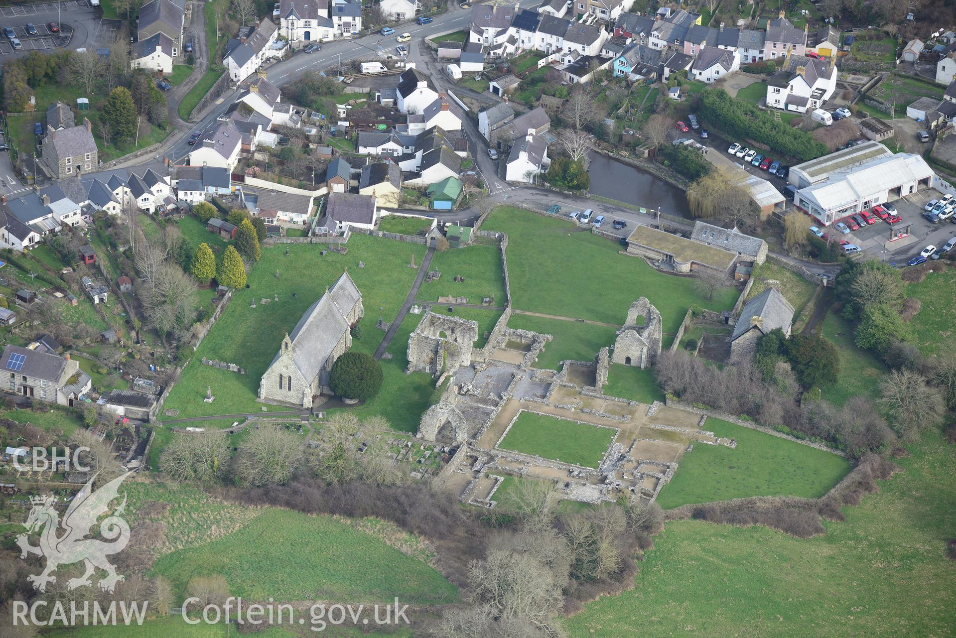 St. Dogmael's Abbey; St. Thomas the Apostle Church; The Vicarage and the Vicarage Stables and Coach House, St. Dogmaels. Oblique aerial photograph taken during the Royal Commission's programme of archaeological aerial reconnaissance by Toby Driver on 13th March 2015.