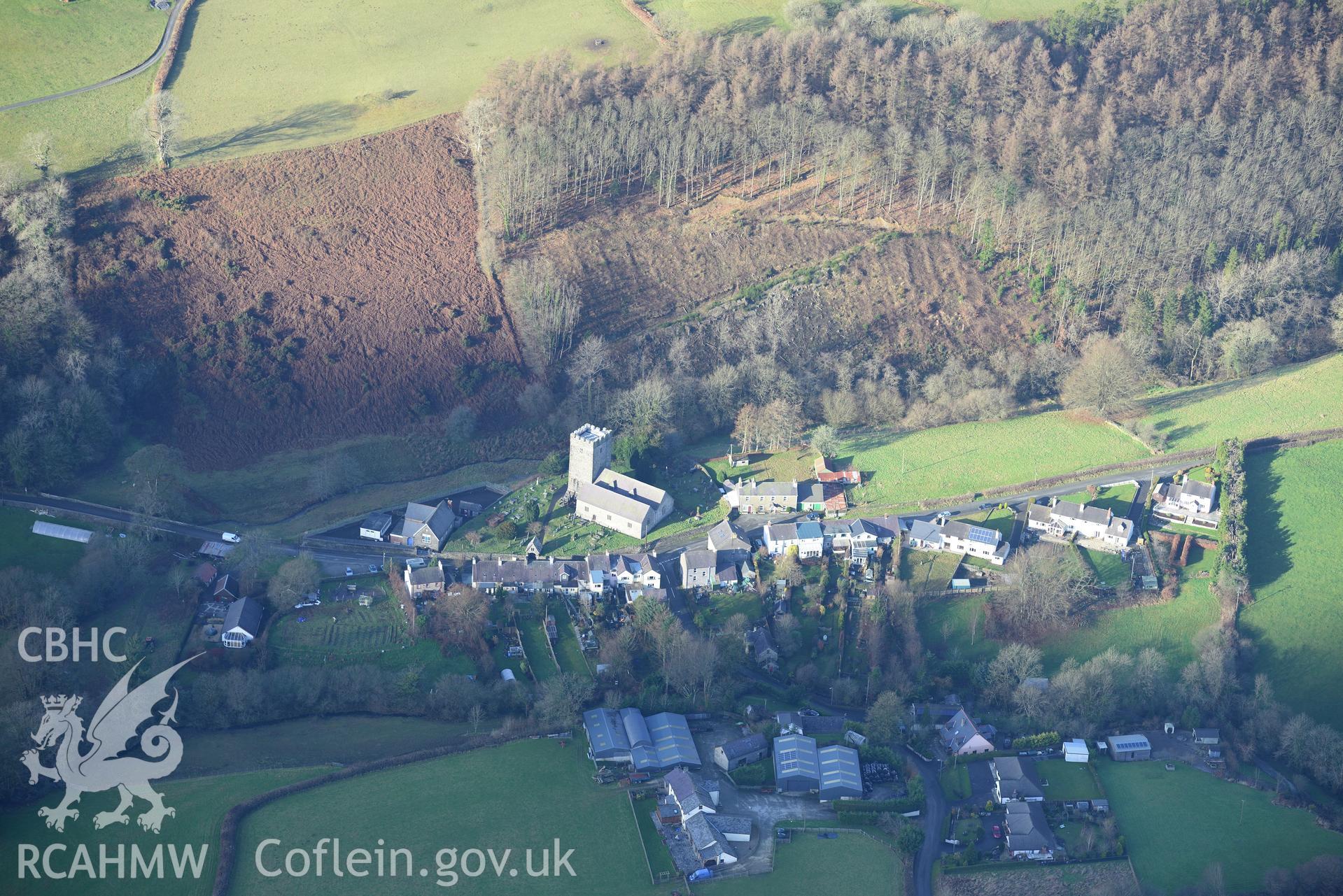 Caio Village and St Cynwyl's Church. Oblique aerial photograph taken during the Royal Commission's programme of archaeological aerial reconnaissance by Toby Driver on 6th January 2015.